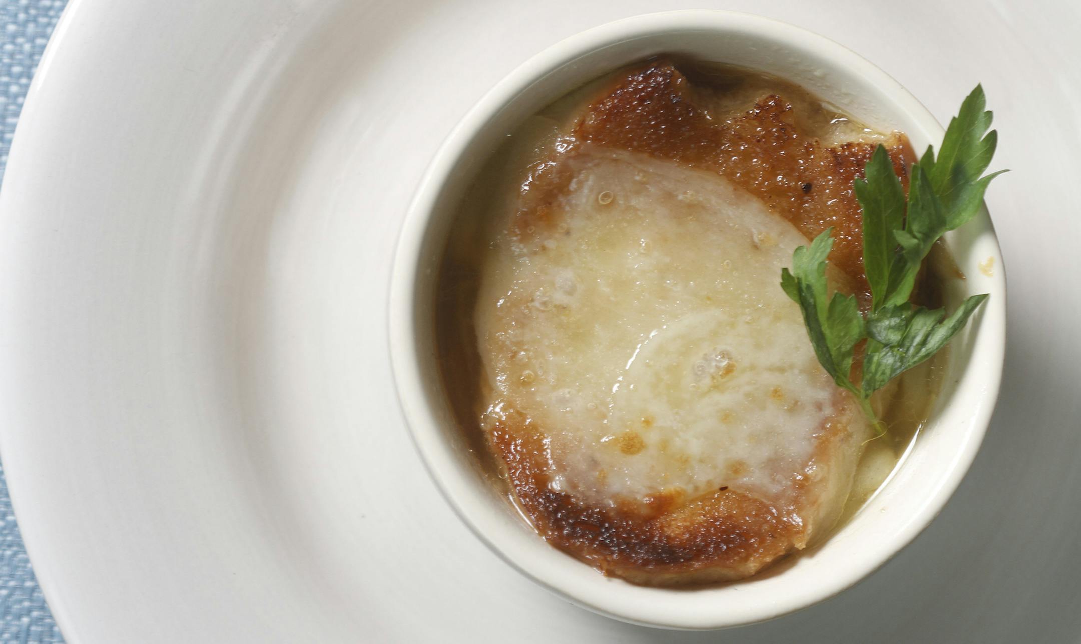 French onion is one of those soups in which all of its parts come together in every spoonful. (Jarrad Henderson/Detroit Free Press/TNS) ORG XMIT: 1175808