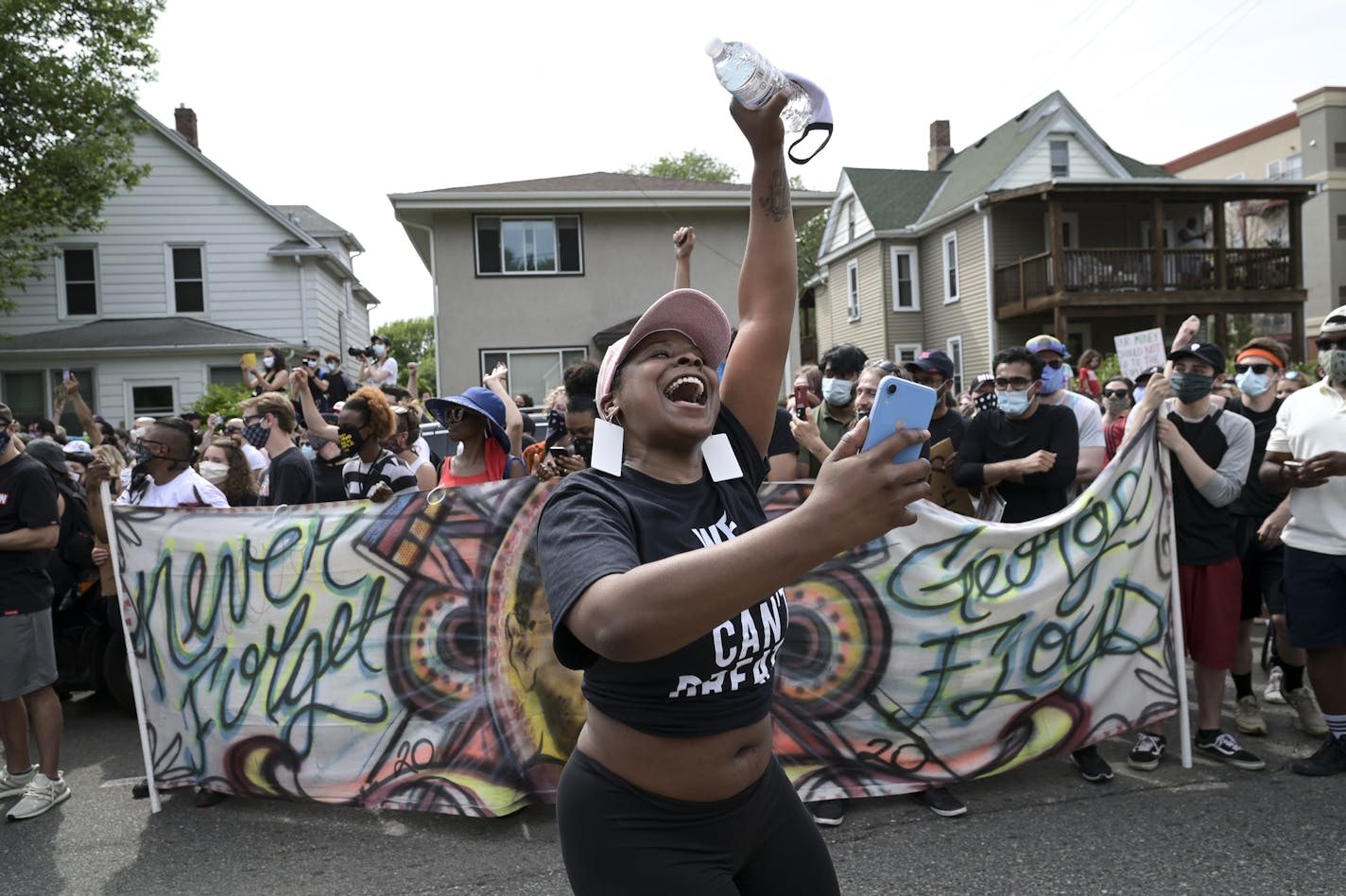 A protester danced in the street as Saturday's march came to a halt outside the Minneapolis Police Union headquarters in Northeast. ] aaron.lavinsky@startribune.com A protest calling to defund police, which began at Bottineau Park in Northeast, was held Saturday, June 6, 2020 in Minneapolis, Minn.