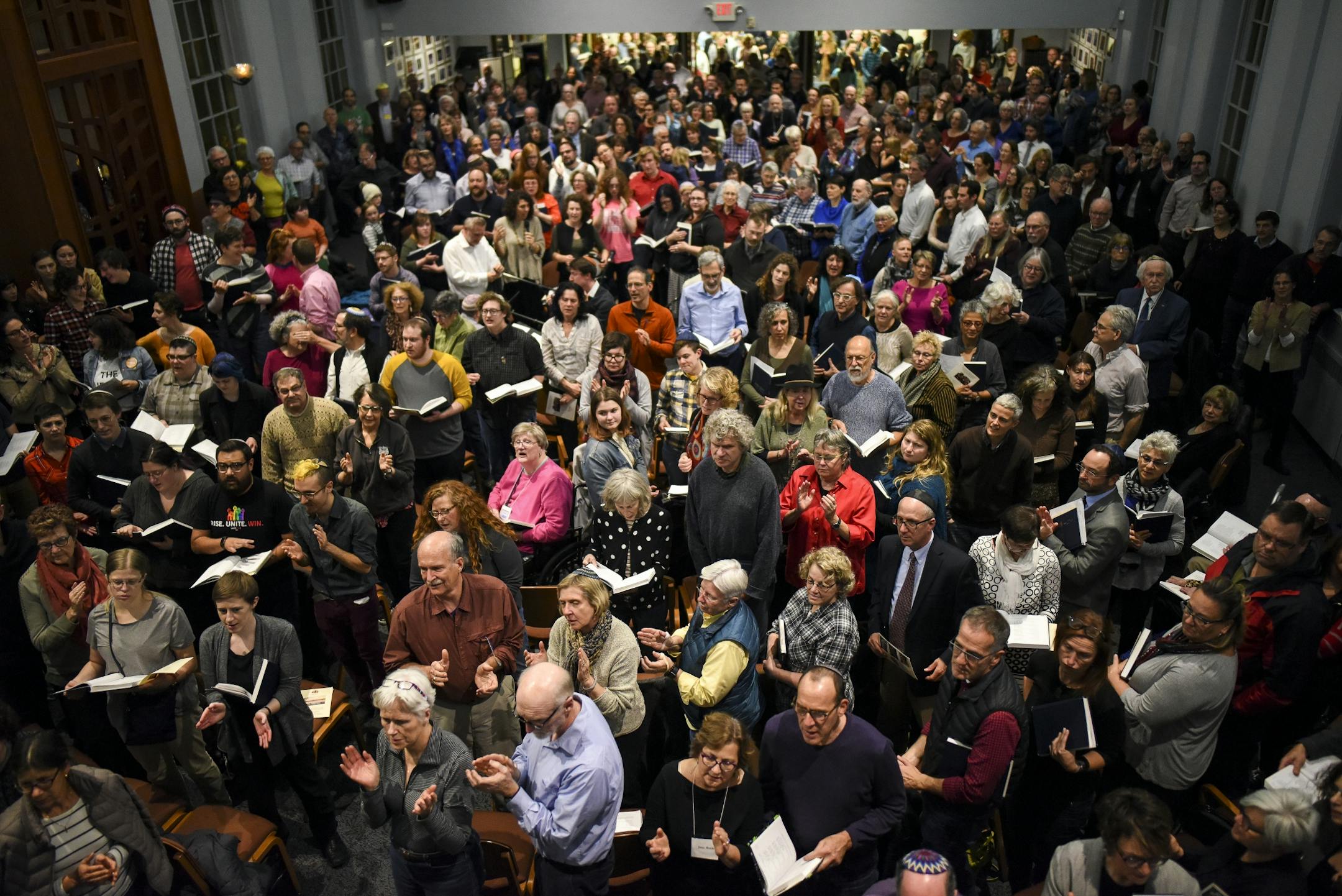 Hundreds of temple goers attended Friday night services at Shir Tikvah. They synagogue ran out of prayerbooks and the sanctuary had to be extended into an overflow area.
