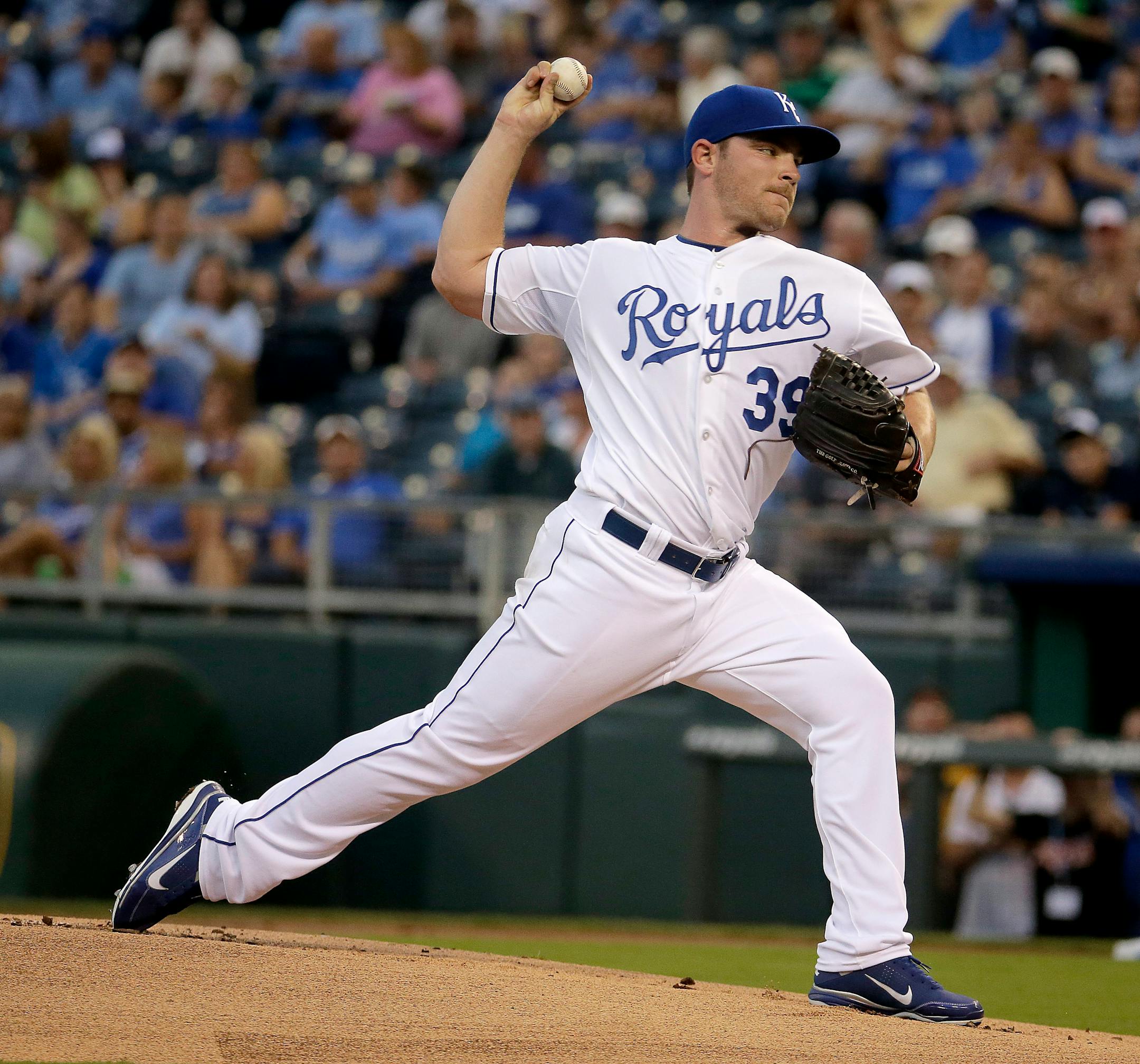 Royals starting pitcher Liam Hendriks throws during the first inning of a baseball game against the Minnesota Twins on Wednesday, Aug. 27, 2014, in Kansas City, Mo. (AP Photo/Charlie Riedel)