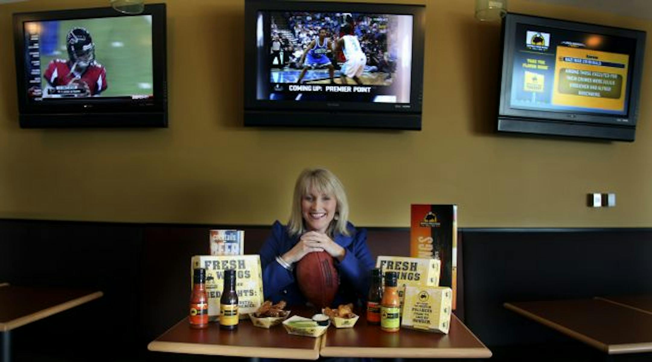 Kathleen Benning is the head of marketing for Buffalo Wild Wings. She spoke about how sports plays into their marketing campaign. Wild Wings is a national chain of sports bars/grills.