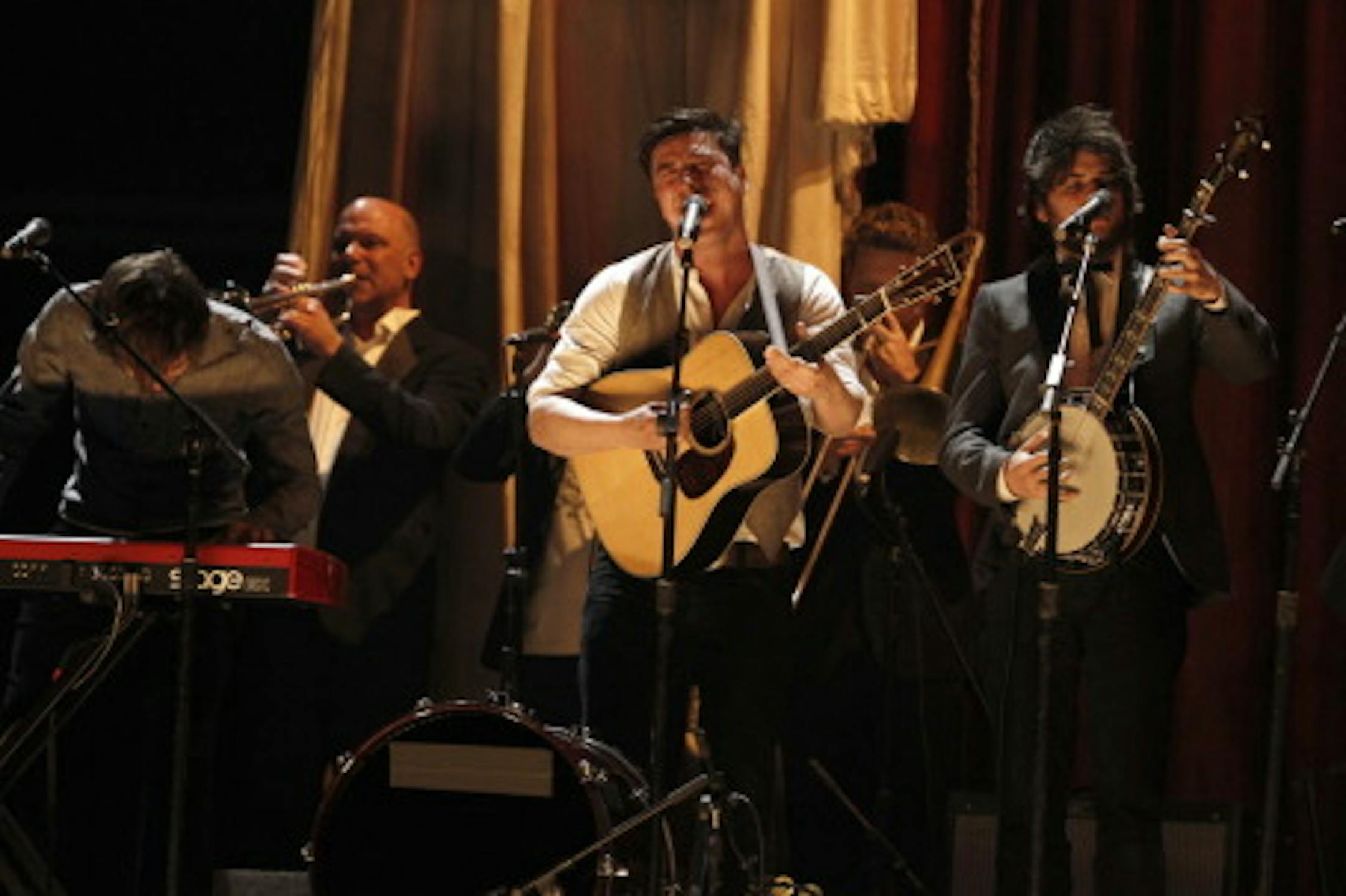 Between their Grammy gig and their stint in Colorado the day after Rock the Garden, Mumford & Sons would fit in well outside the Walker Art Center this summer. / Associated Press