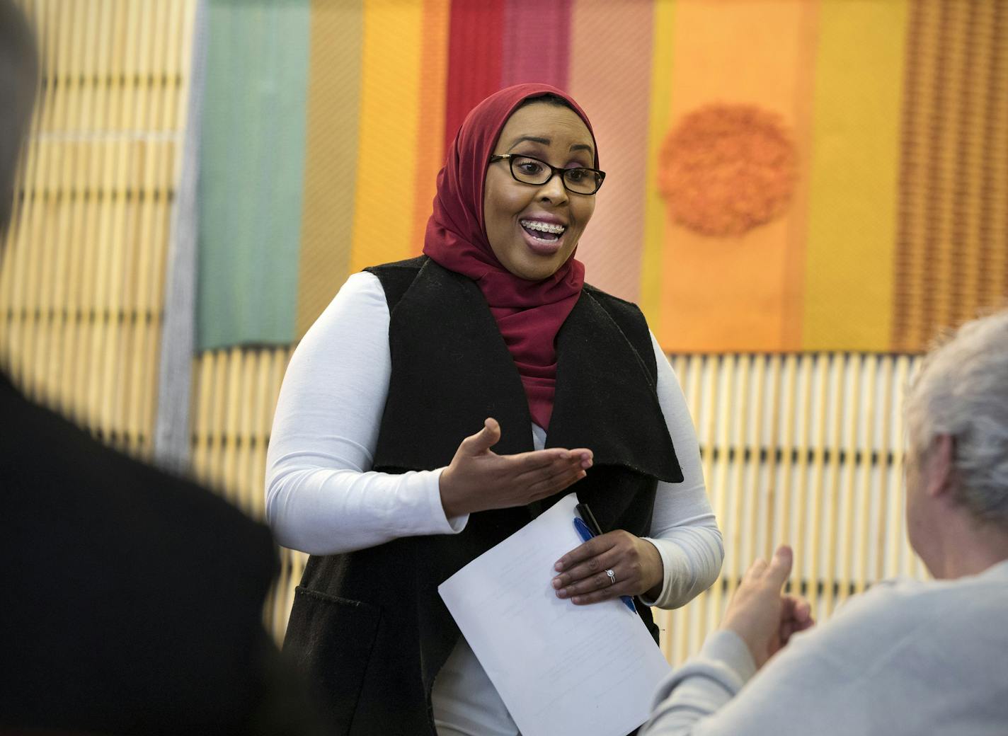 Hudda Ibrahim gets to know guests before the start of the &#xd2;Dine and Dialogue: How to Build a Better Minnesota&#xd3; event Saturday, April 6, 2019, at the St. Cloud Public Library in St. Cloud, MN.