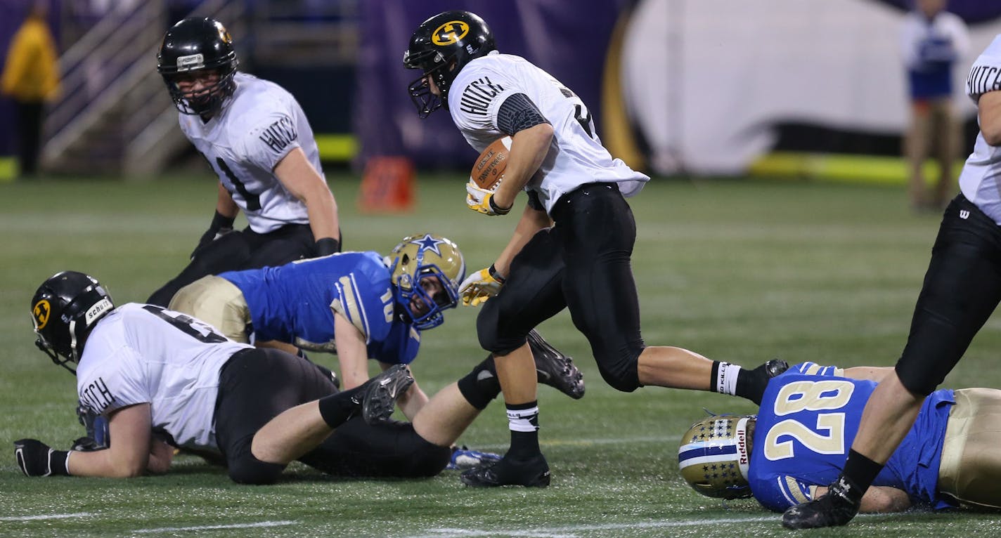 Hutchinson's Robbie Grimsley, ran passed the Holy Angels defense during the first half of the 4A State Championship at the Mall of America Field in Minneapolis, Min., Friday, November 29, 2013. ] (KYNDELL HARKNESS/STAR TRIBUNE) kyndell.harkness@startribune.com