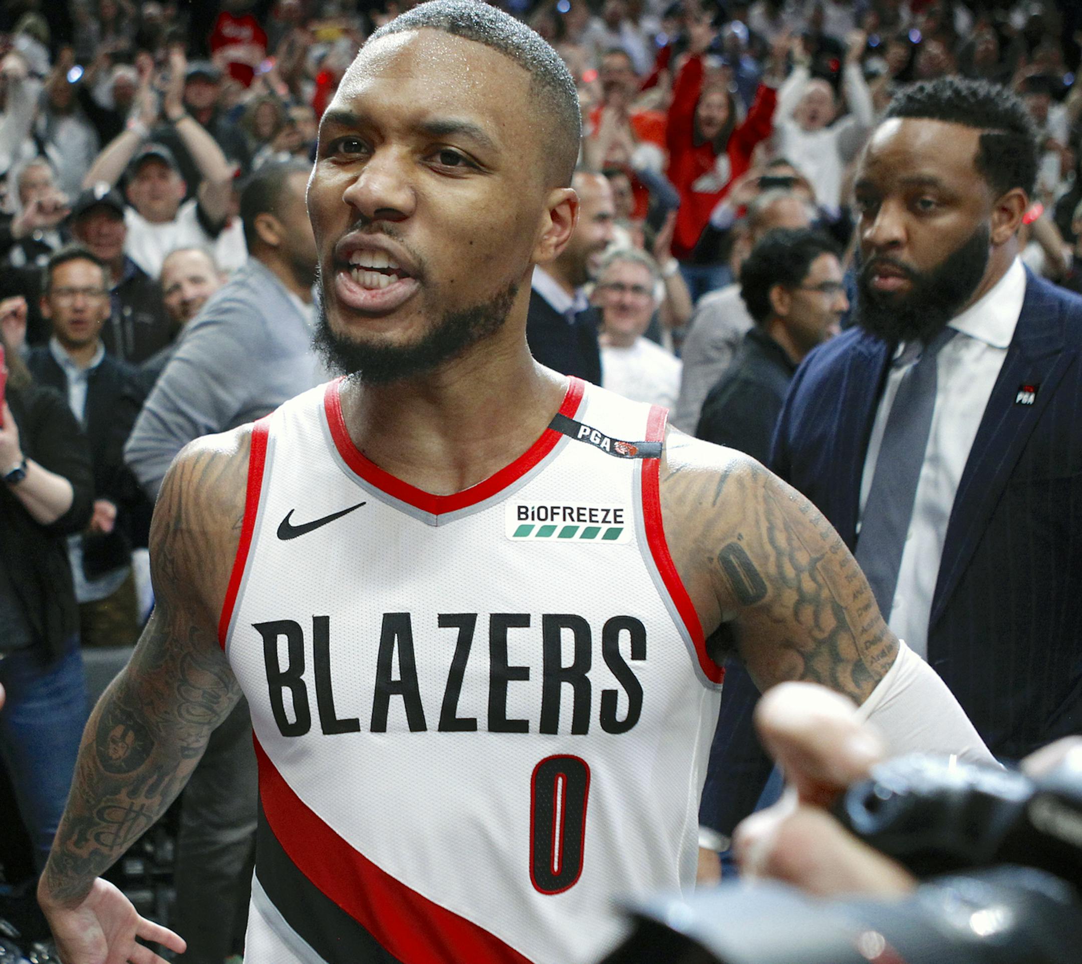 Portland Trail Blazers' Damian Lillard leaves the court after hitting the game-winning three-pointer to beat the Oklahoma City Thunder 118-115 in Game 5 of their best-of-seven first-round playoff series in Portland, Ore., Tuesday, April 23, 2019. Lillard finished with a franchise playoff-record 50 points and Portland eliminated Oklahoma City from the postseason. (Sean Meagher/The Oregonian via AP)