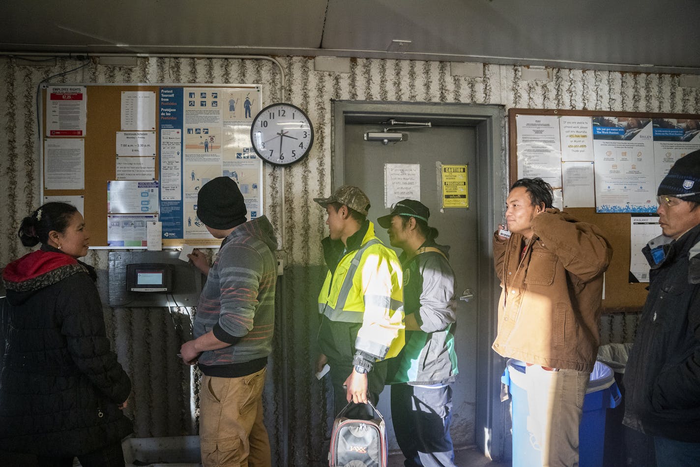 Workers at the Bailey Nurseries warehouse clock out for the day on Wednesday, January 16, 2019. Last year Minnesota took in just 663 Karen refugees -- the lowest number in well over a decade, and a drastic drop from the several thousand a year that's become the norm.