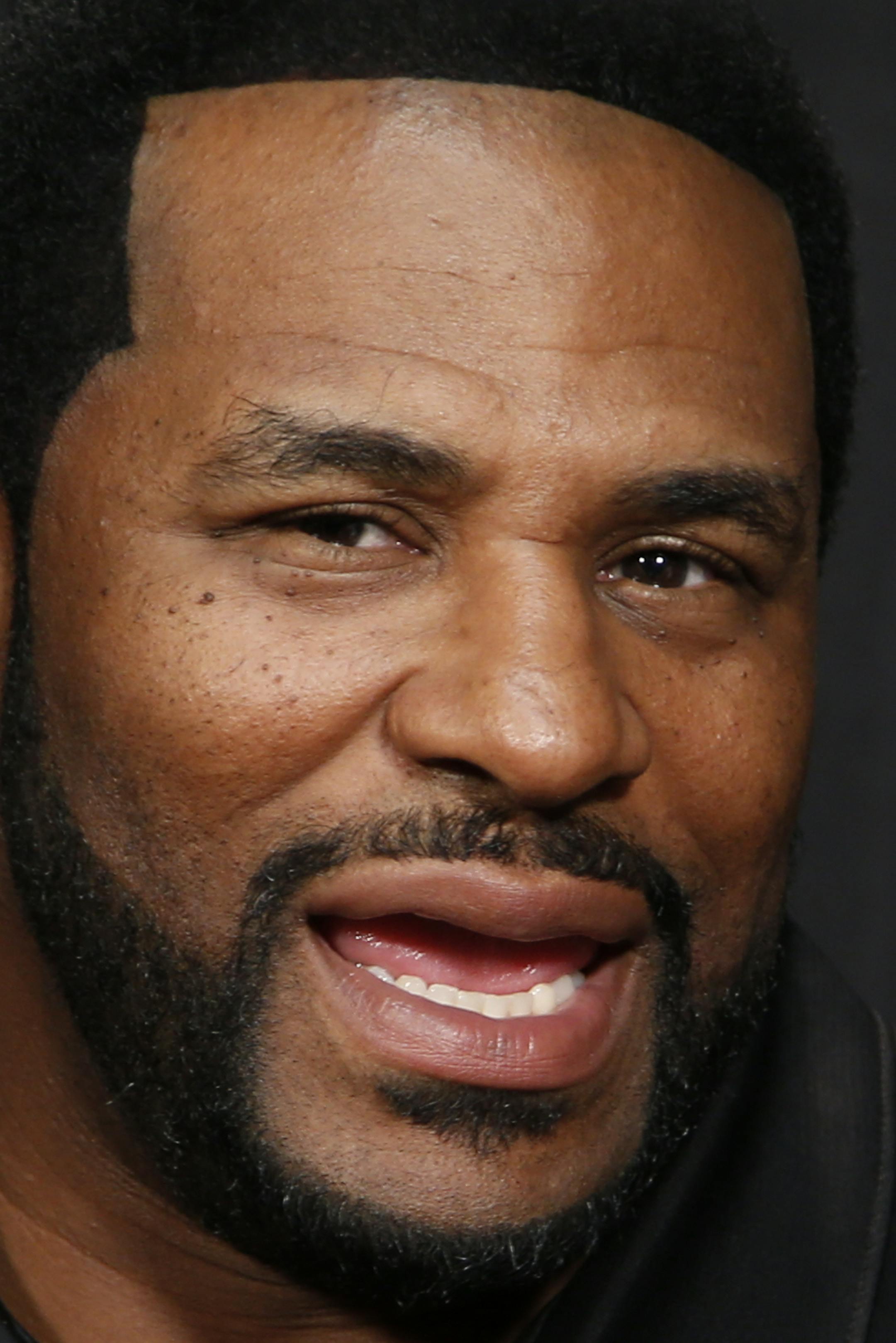 Pro Football Hall of Fame 2015 inductee Jerome Bettis is surrounded by reporters during a media availability in Canton, Ohio, Friday, Aug. 7, 2015. (AP Photo/Gene J. Puskar)
