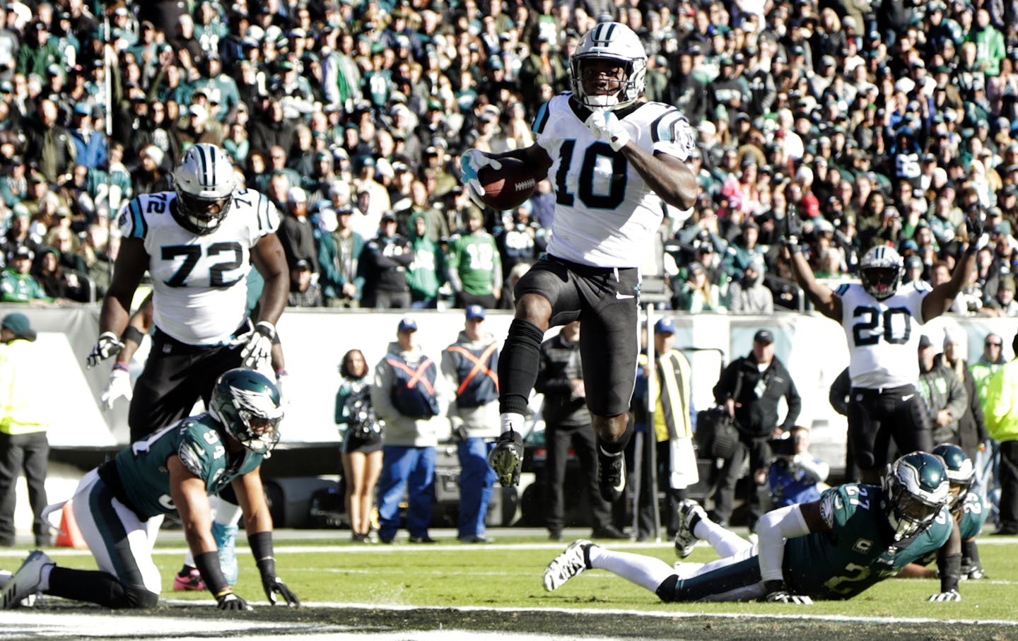 Carolina Panthers wide receiver Curtis Samuel (10) scores on a touchdown run against the Philadelphia Eagles during the second half of an NFL football game, Sunday, Oct. 21, 2018, in Philadelphia. (AP Photo/Michael Perez)