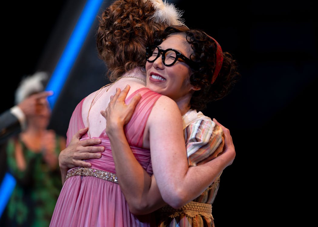 Amelia Pedlow, left, who plays Emma Woodhouse, embraced Sun Mee Chomet, who plays Miss Bates, before a rehearsal last week of “Emma” at the Guthrie Theater in Minneapolis.