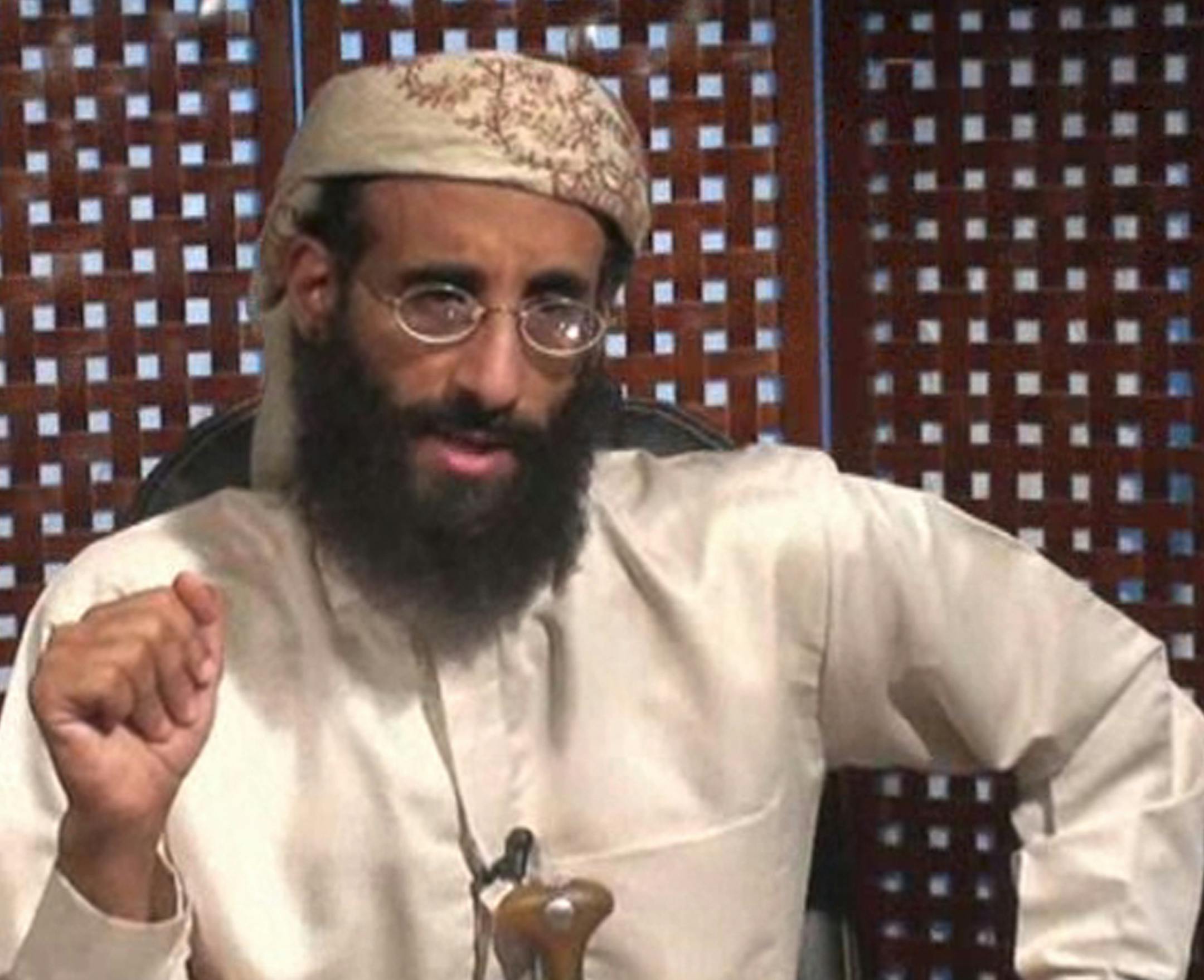 FILE - In this In this Monday, Nov. 8, 2010 file image taken from video and released by SITE Intelligence Group, Anwar al-Awlaki speaks in a video message posted on radical websites. Al-Qaida's Yemeni offshoot on Monday confirmed the killing of U.S.-born militant cleric Anwar al-Awlaki late last month and vowed to avenge the prominent progagadist's death. (AP Photo/SITE Intelligence Group, File) NO SALES, MANDATORY CREDIT ORG XMIT: MIN2014070117281038