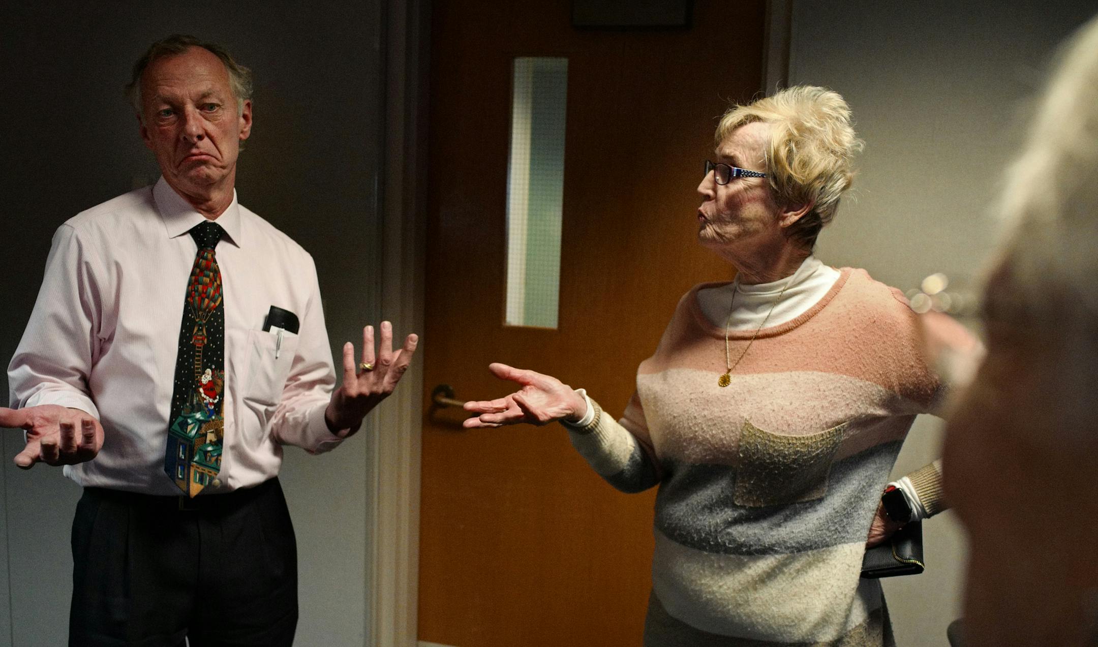 Anoka County Commissioner Jim Kordiak, far left, who oversees the internal audit committee as the chair chatted with Dee Ann Christensen about speaking to the League of Women Voters, a group to which she belongs.]Observer Corps members will be at an Internal Audit Committee Meeting Wednesday morning, evaluation forms in hand. They keep tabs of board meetings and say they've not been allowed to speak at past meetings -- a clear violation of Anoka County's public comment policy. Richard Tsong-Taat