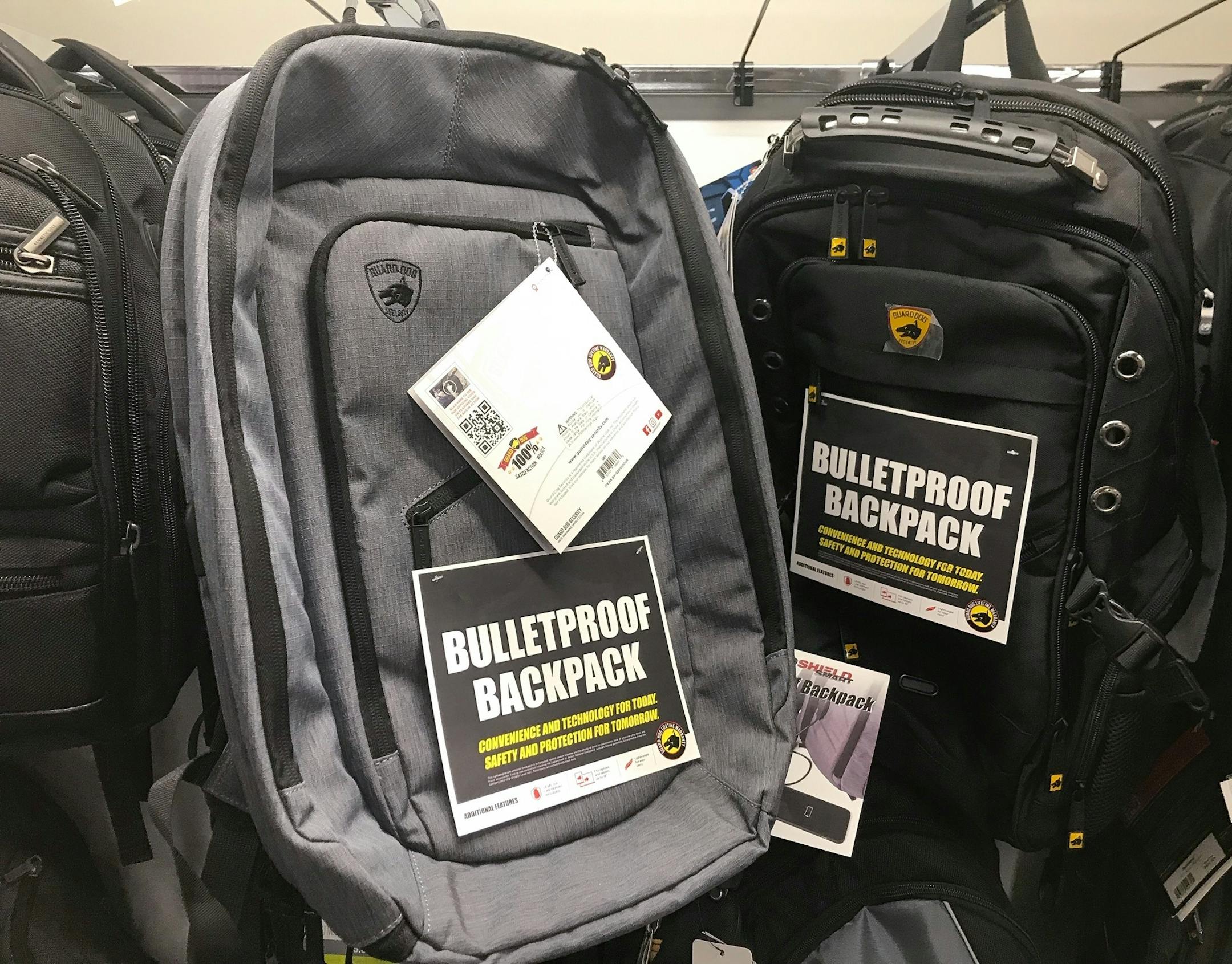 This Thursday, Aug. 8, 2019 photo shows bulletproof backpacks that for sale at an Office Depot store in Evanston, Ill.. With the rise of mass shooting, companies like Guard Dog Security, TuffyPacks and Bulletblocker are creating bullet-resistant backpacks for children for the back-to-school shopping season. Many say they’re seeing an increase in sales in their products leading up to the fall, and typically see a spike in sales after a mass shooting. (AP Photo/Teresa Crawford) ORG XMIT: RP