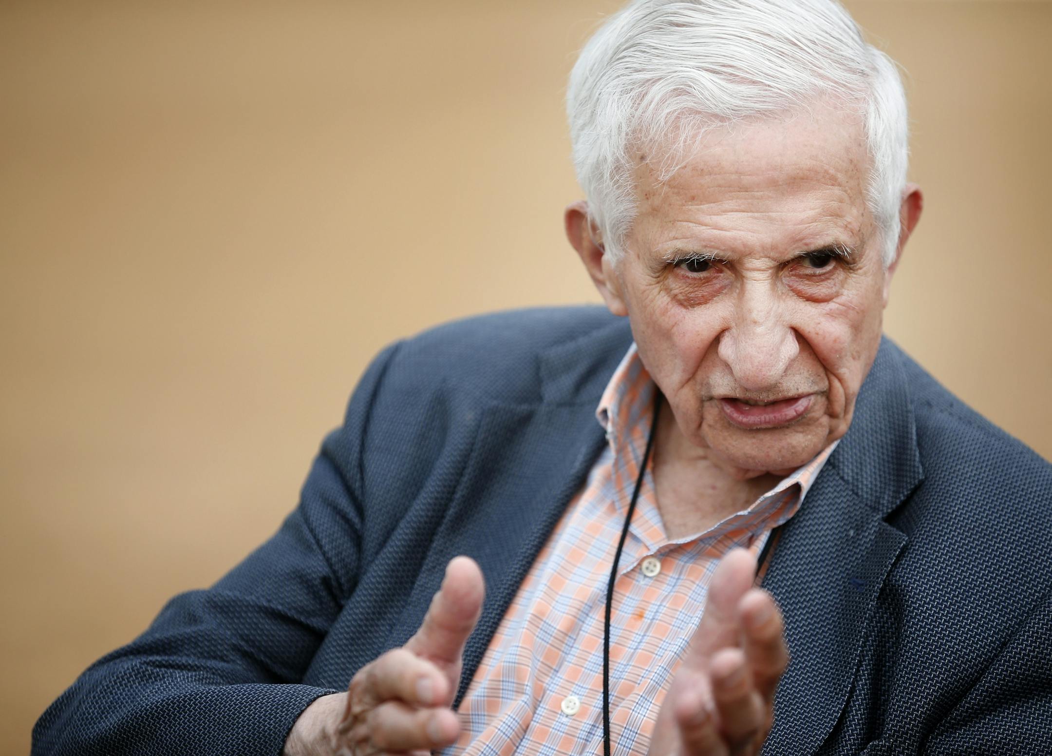 Star Tribune spots columnist Sid Harman spoke to family members before a dedication ceremony in his honor. Northeast Park in Minneapolis has been renamed Sid Hartman All Star Field.