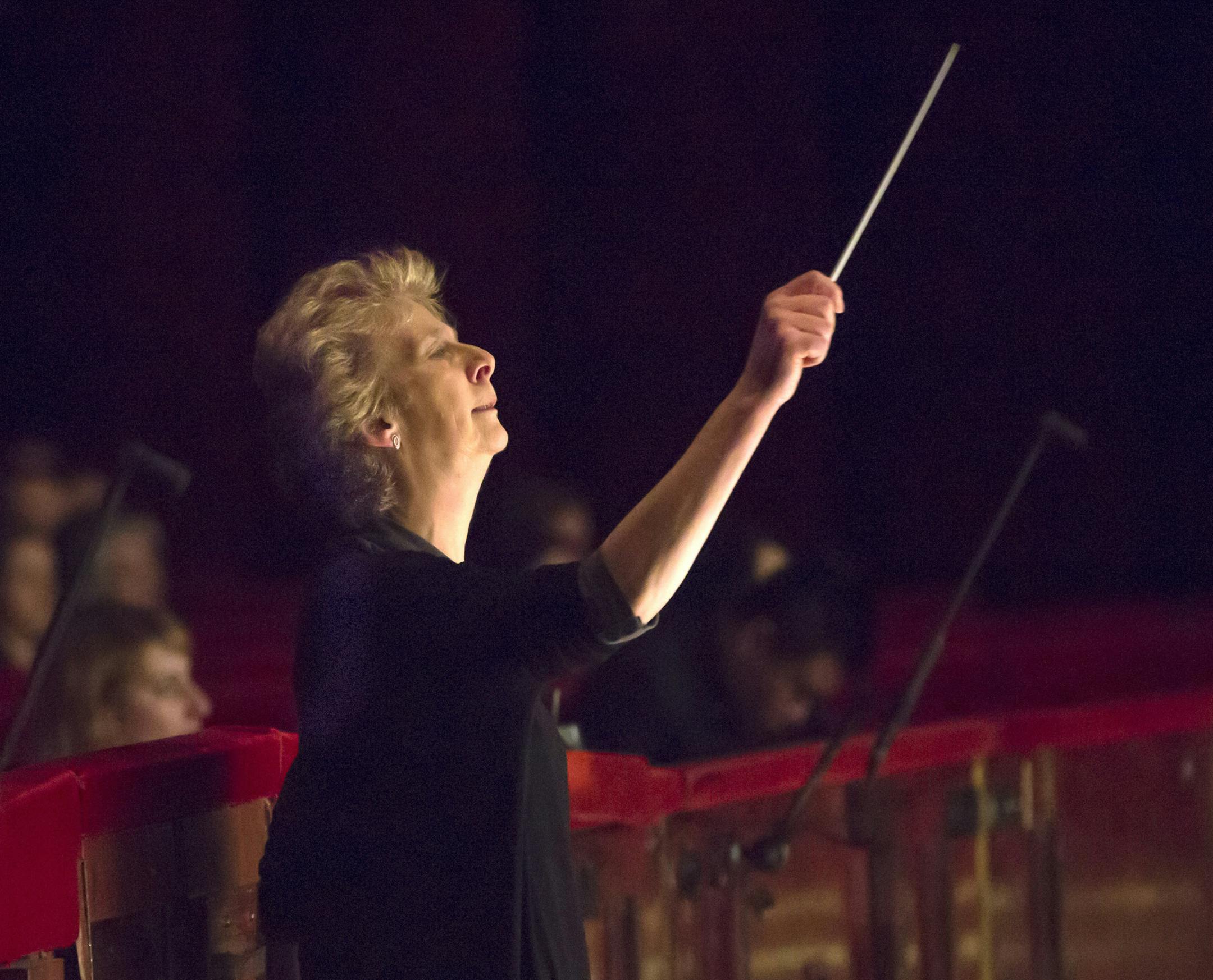 FILE -- Jane Glover conducts a dress rehearsal of "The Magic Flute" at the Metropolitan Opera in New York, Dec. 10, 2013. Later that week she became only the third female conductor in the Met's 133-year history, a sign of the very slow gains being made by women in the traditionally male-dominated world of orchestra. (Sara Krulwich/The New York Times) -- PHOTO MOVED IN ADVANCE AND NOT FOR USE - ONLINE OR IN PRINT - BEFORE DEC. 22, 2013. ORG XMIT: XNYT50