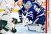 Toronto Maple Leafs goaltender Ilya Samsonov (35) makes a save against Minnesota Wild center Marco Rossi (23) during the third period of an NHL hockey