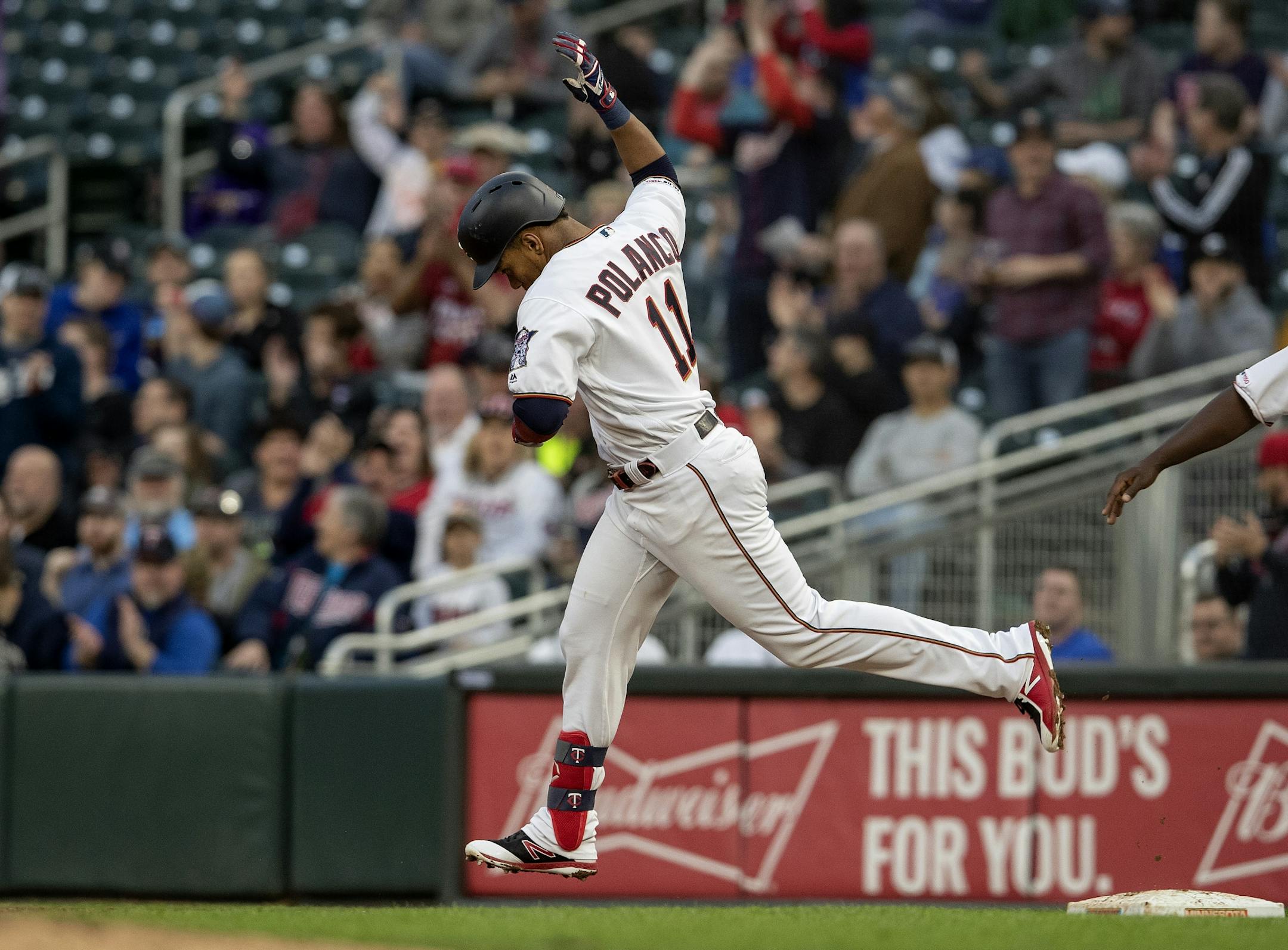 Jorge Polanco rounded first base after hitting a home run in the bottom of third inning.