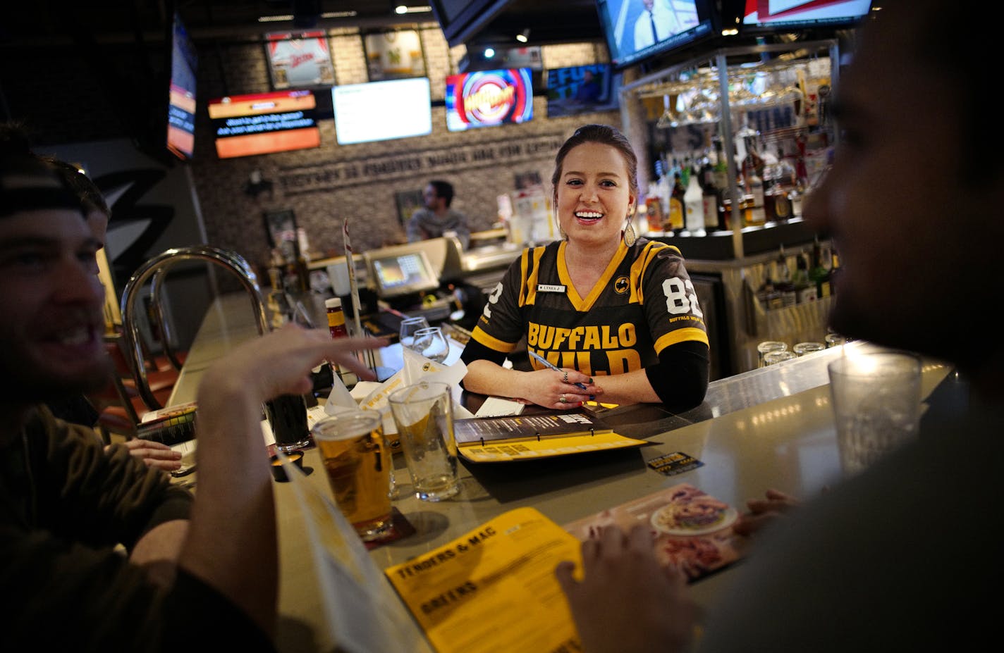 Bartender Lynea Vance has worked for Buffalo Wild Wings for two years and enjoys interacting with customers. The Southdale location of Buffalo Wild Wings has its regulars.] Arby's is taking over Buffalo Wild Wings. Richard Tsong-Taatarii/rtsong-taatarii@startribune.com