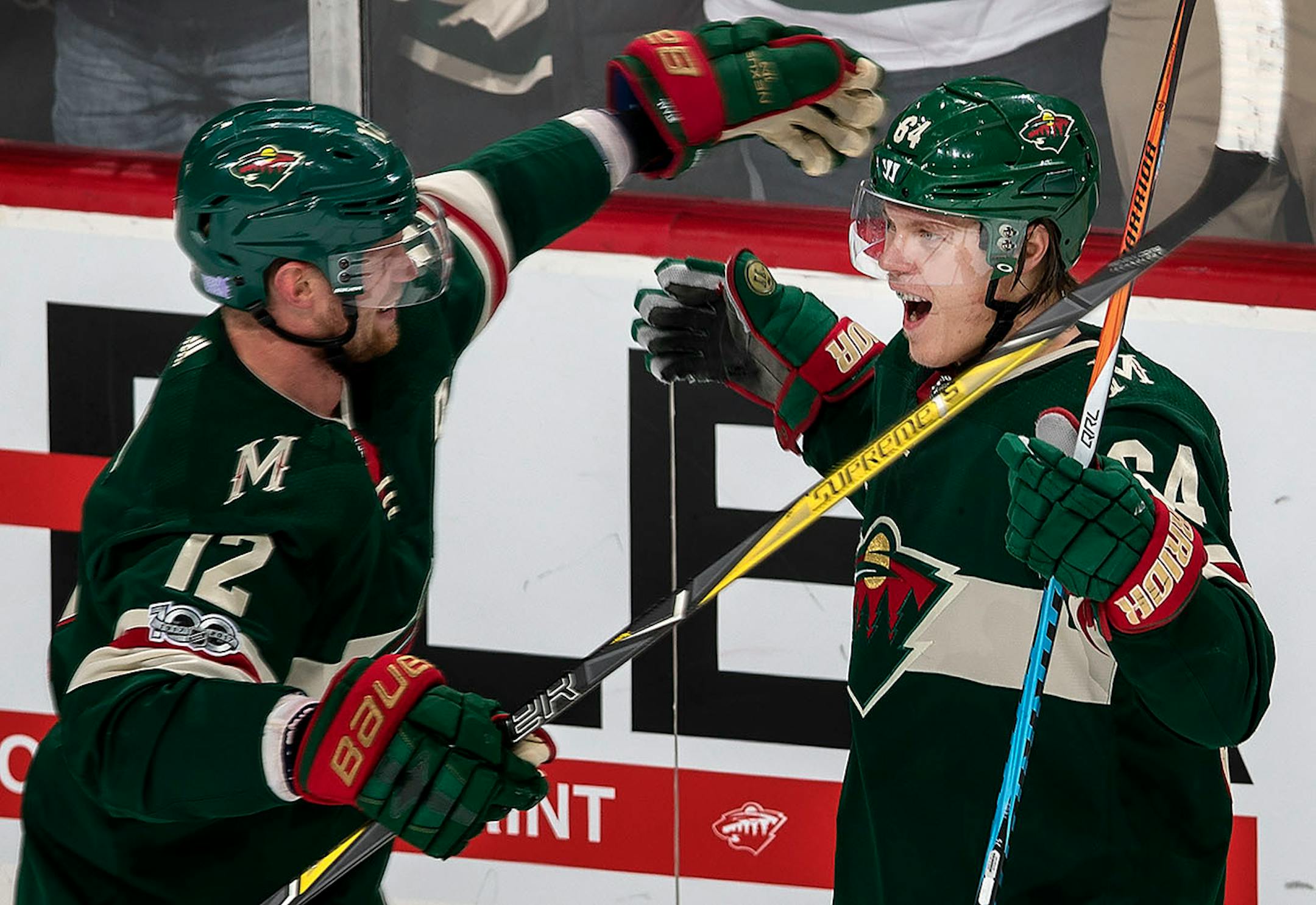 Mikael Granlund (64) celebrated with Eric Staal (12).