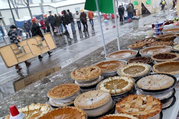 BlacksGiving event on Thanksgiving outside the Minneapolis Police Department�s 4th precinct Thursday, Nov. 26, 2015, in Minneapolis. Here, a table i