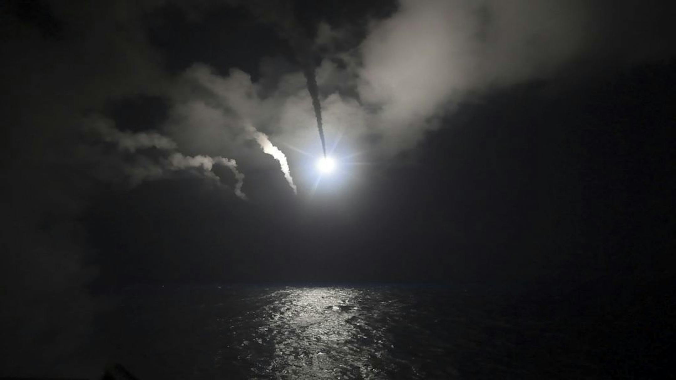 In an image provided by the U.S. Navy, the destroyer USS Porter launches a Tomahawk missile from the Mediterranean Sea on April 7, 2017. Russia on Friday froze a critical agreement on military cooperation with the U.S. in Syria after an American military strike against its Middle East ally, warning that the operation would further corrode already dismal relations between Moscow and Washington. Syria on Friday condemned the American strikes as �a disgraceful act.� (Spc. 3rd Class Ford Williams/U.