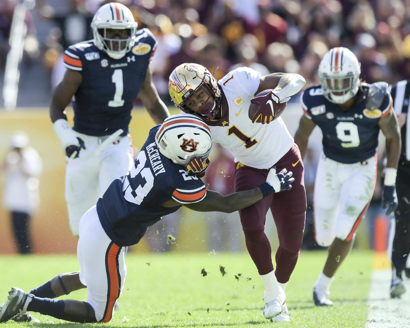 Auburn Tigers defensive back Roger McCreary (23) tackled Minnesota Gophers running back Rodney Smith (1) out of bounds in the second quarter as Smith made a first down. ] Aaron Lavinsky &#x2022; aaron.lavinsky@startribune.com The Minnesota Gophers played the Auburn Tigers in the Outback Bowl on Wednesday, Jan. 1, 2020 at Raymond James Stadium in Tampa, Fla.