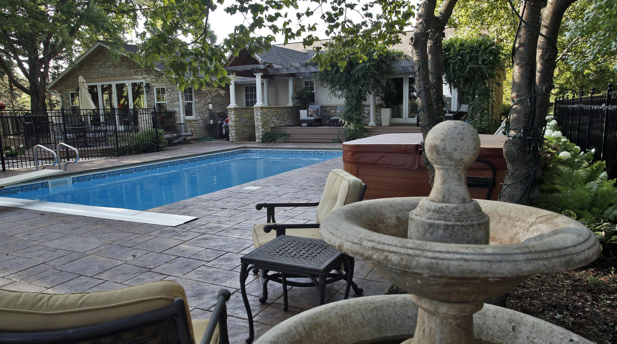 A look at the remodeled home of Jeff McCloskey in Mendota Heights. Back side of the home opening onto a pool and patio. (MARLIN LEVISON/STARTRIBUNE(mlevison@startribune.com
