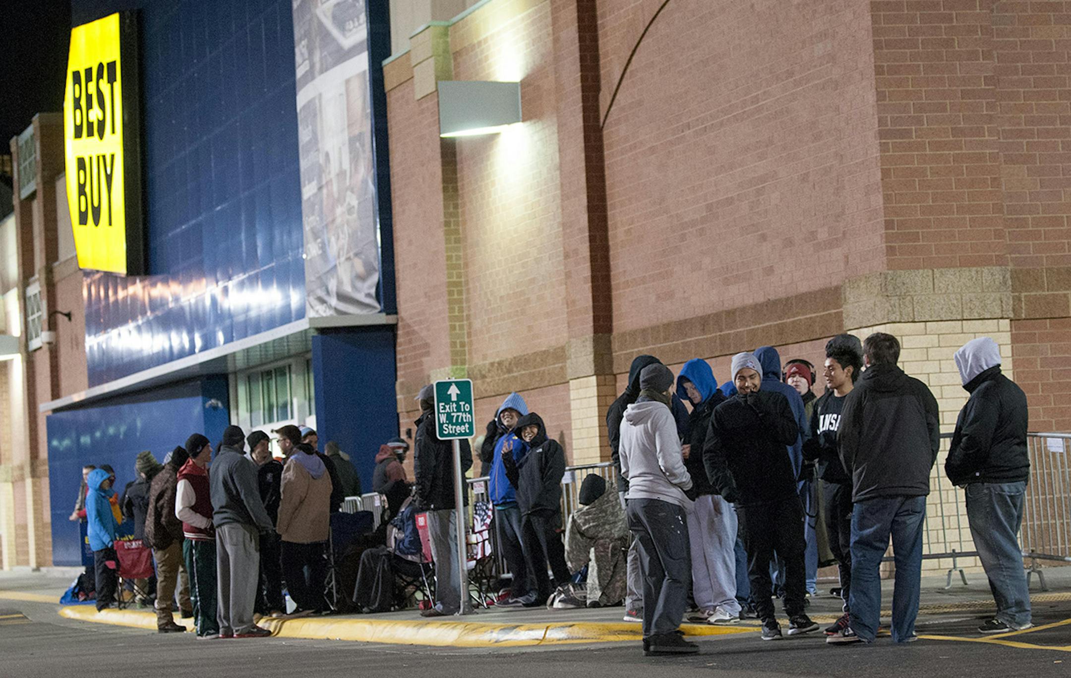 Customers wait in line at the Best Buy store in Richfield, Minn. to be the first to buy the PlayStation 4 at 12:01 a.m. Friday, Nov. 15 (Photo Credit: Best Buy)