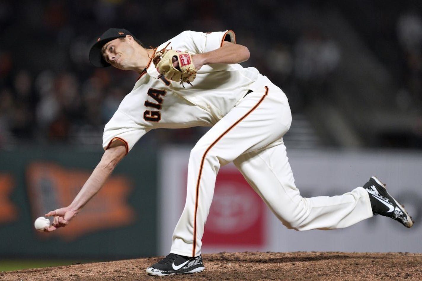 San Francisco Giants pitcher Tyler Rogers throws to an Arizona Diamondbacks batter during the eighth inning of a baseball game in San Francisco, Tuesday, Aug. 27, 2019.