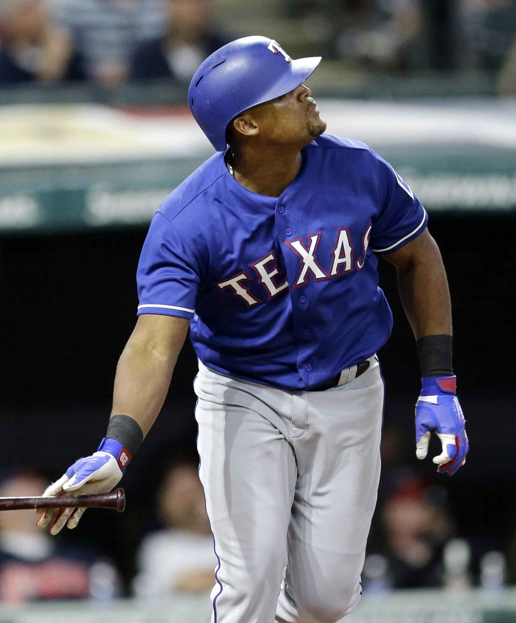 Texas Rangers' Adrian Beltre watches the ball after hitting a solo home run off Cleveland Indians relief pitcher Cody Allen in the ninth inning of a baseball game, Tuesday, June 27, 2017, in Cleveland. (AP Photo/Tony Dejak)