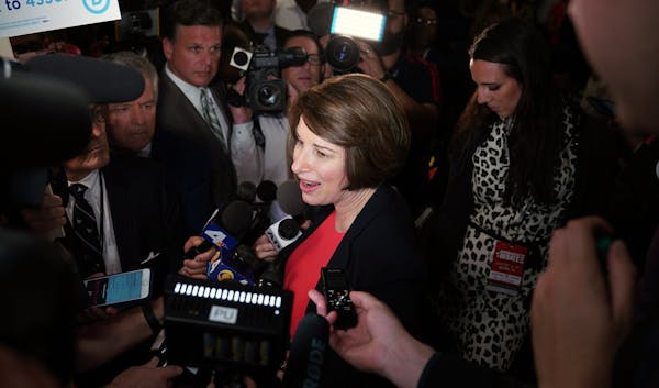 Sen. Amy Klobuchar (D-Minn.) speaks to reporters after the close of the first Democratic presidential debate in Miami on Wednesday night, June 26, 201