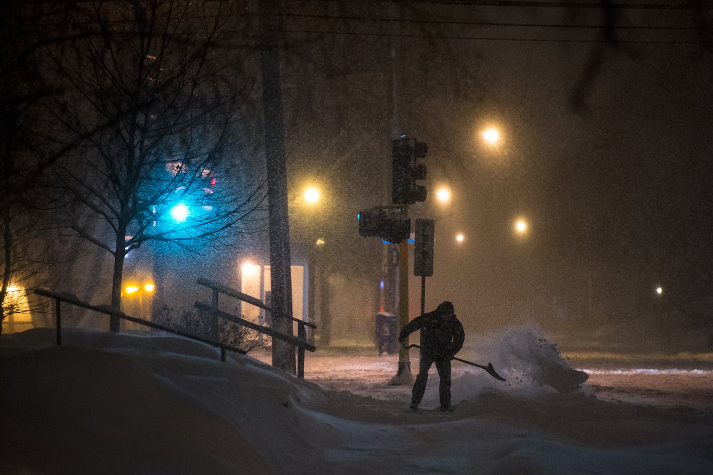 Steve Kaplan, of Minneapolis, shoveled snow outside his home at Bryant and 31st Avenue. Kaplan said it was his second time shoveling today and that he'd rather "shovel three inches at a time than eight." ] (AARON LAVINSKY/STAR TRIBUNE) aaron.lavinsky@startribune.com Snow features photographed Tuesday, Feb. 2, 2016 in Minneapolis, Minn.