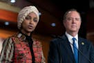 Rep. Ilhan Omar, D-Minn., with Rep. Adam Schiff, D-Calif., right, spoke during a news conference on Capitol Hill in Washington on Wednesday.