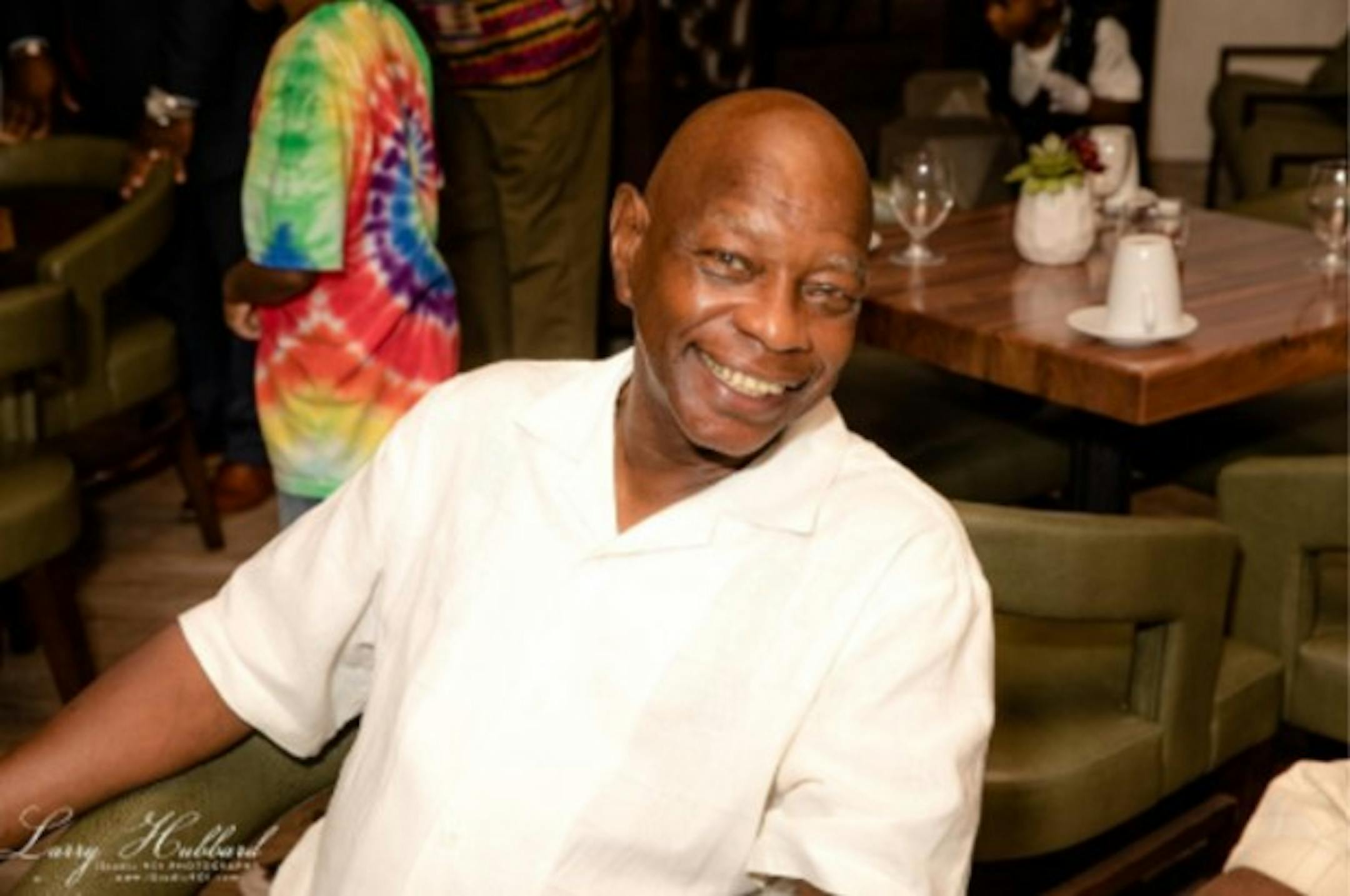 Image of Clarence White, an expert on roses at the University of Minnesota Landscape Arboretum.