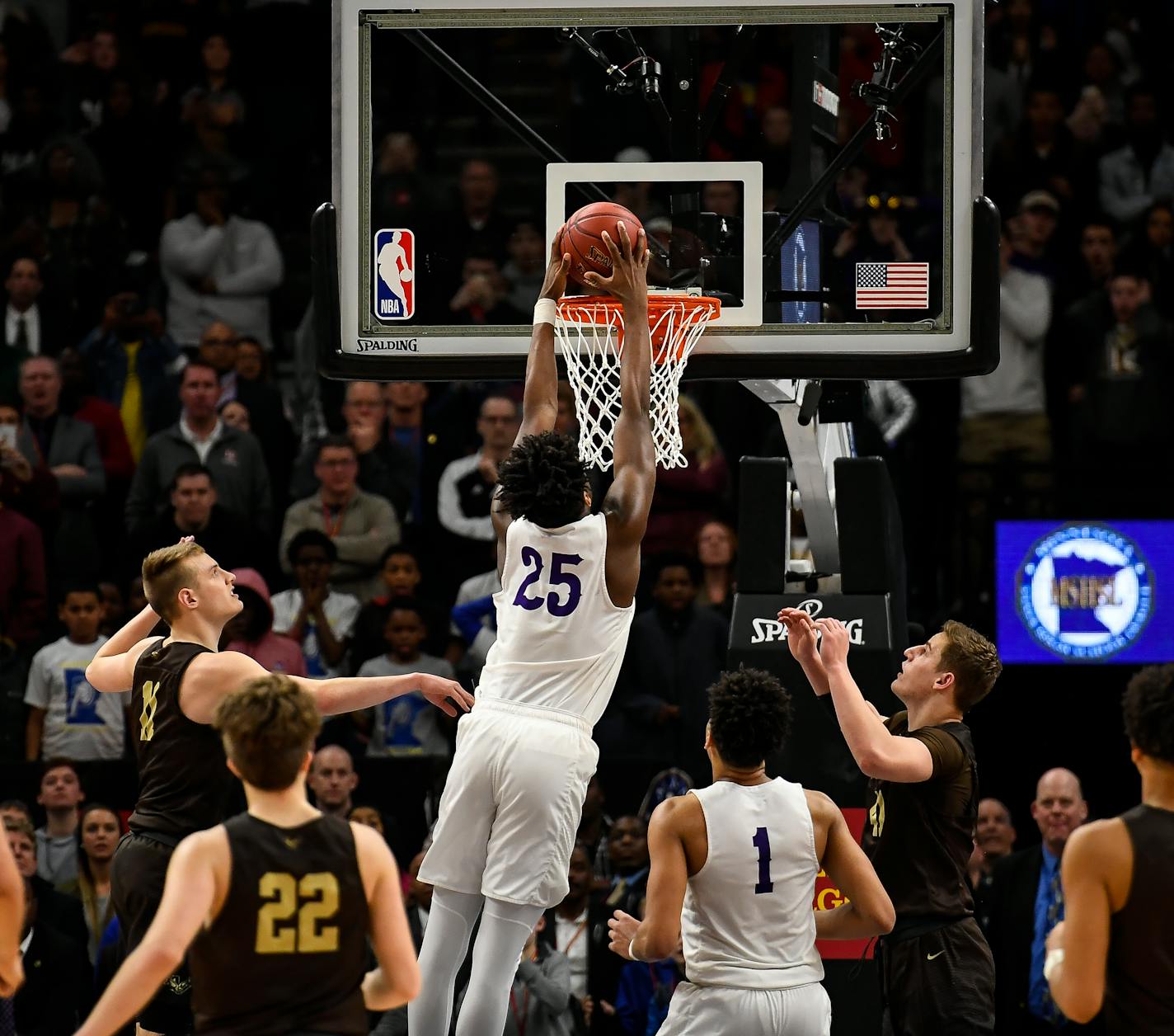 Cretin-Derham Hall's Daniel Oturu dunked the ball with .5 seconds left on the clock to win the title over Apple Valley.