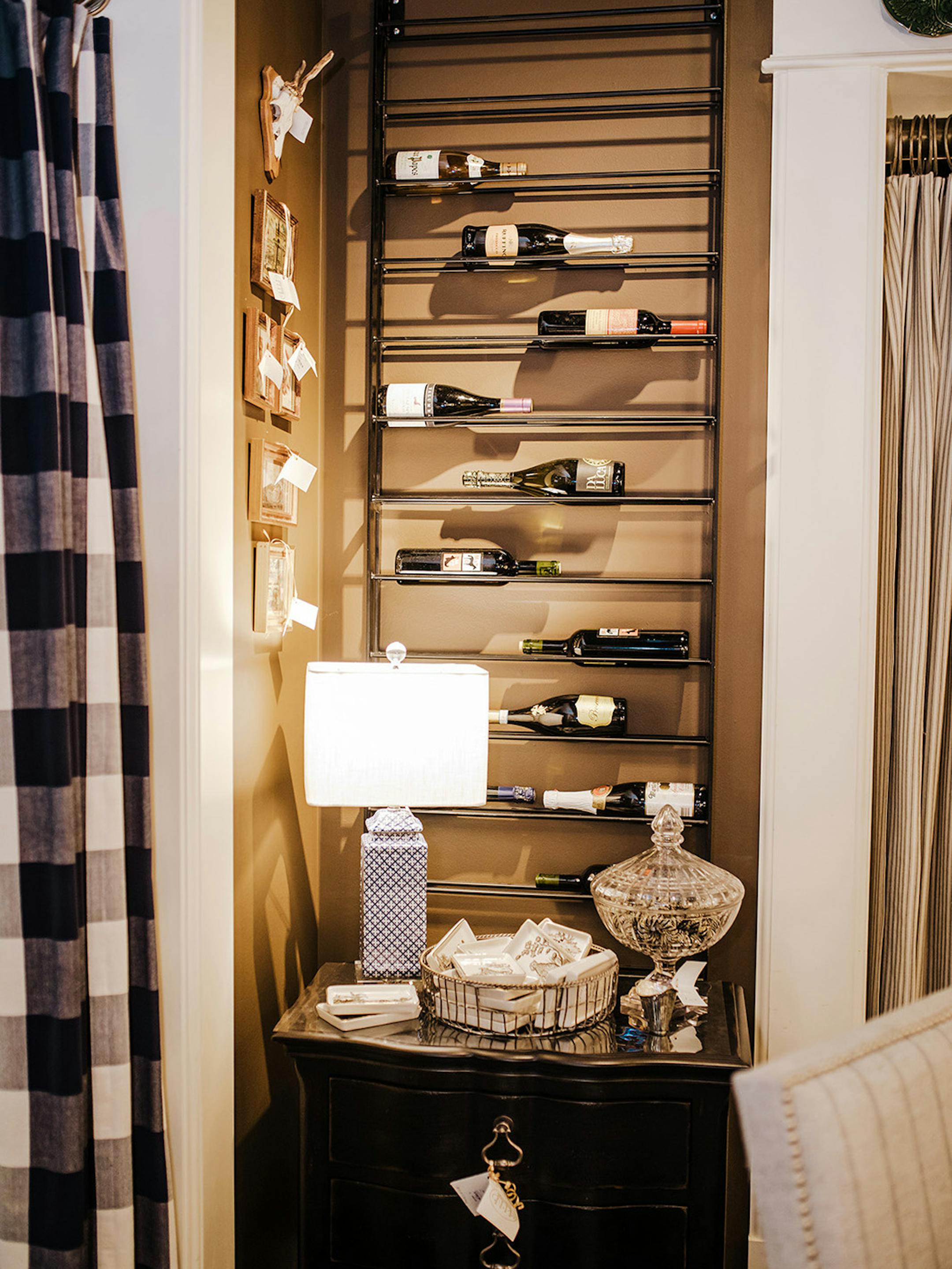 When decorating small spaces, using your area for form and function is key. One great way to do this is a climbing wine rack.