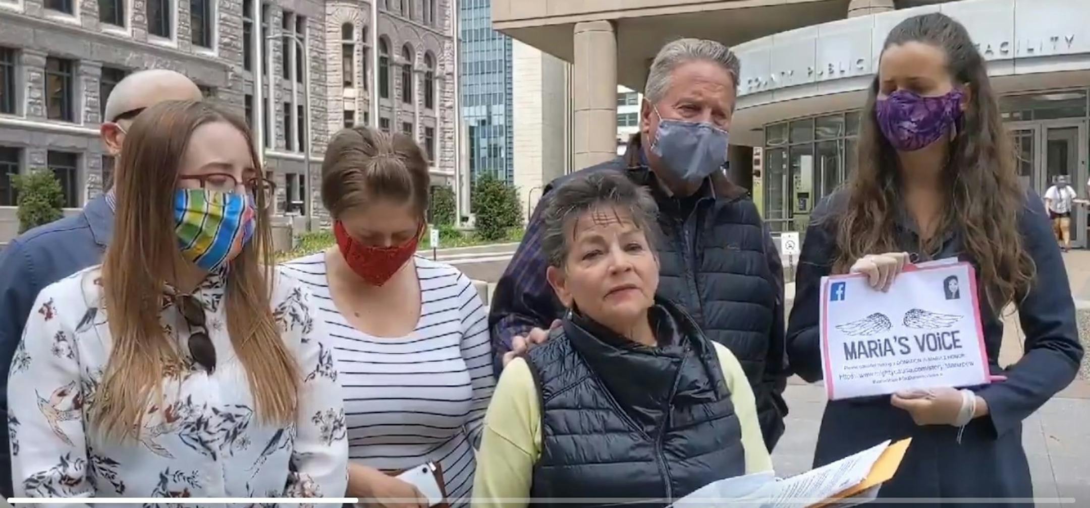 Maria Fury's mother, Lissa Weimelt, center, spoke Wednesday after her son-in-law, Joshua Fury, appeared in court on charges that he murdered his wife. Maria Fury's father, Bill Pew, and four cousins stood behind Weimelt.