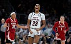 South Carolina guard Bree Hall (23) celebrates after making a three-point basket during the second half of a Final Four college basketball game agains