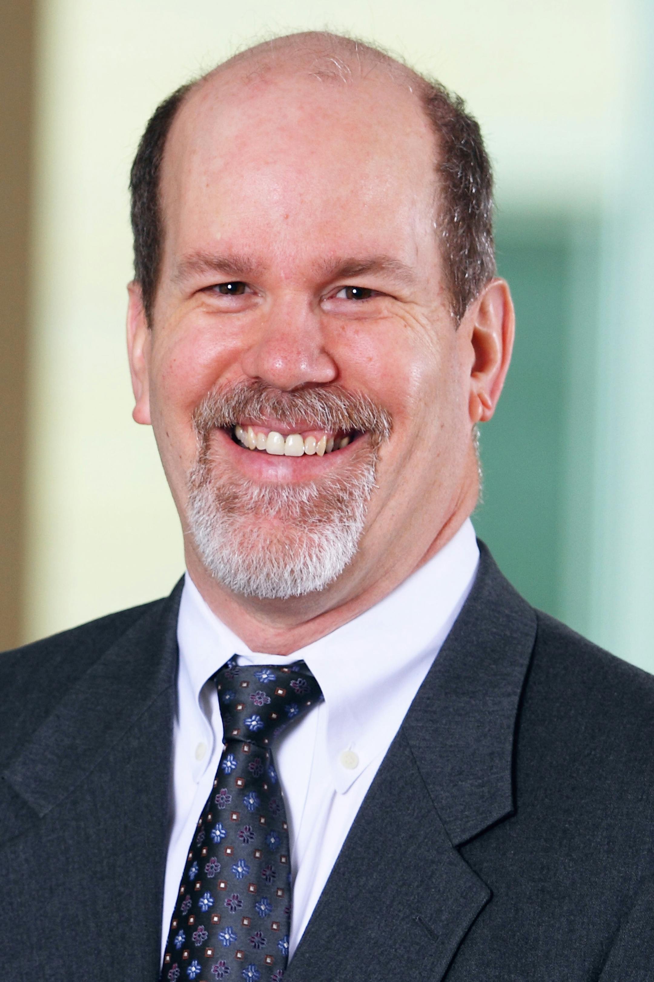 Environmental portrait of David Alexander taken on Friday, April 12, 2013 on the Minneapolis campus of the University of St. Thomas.