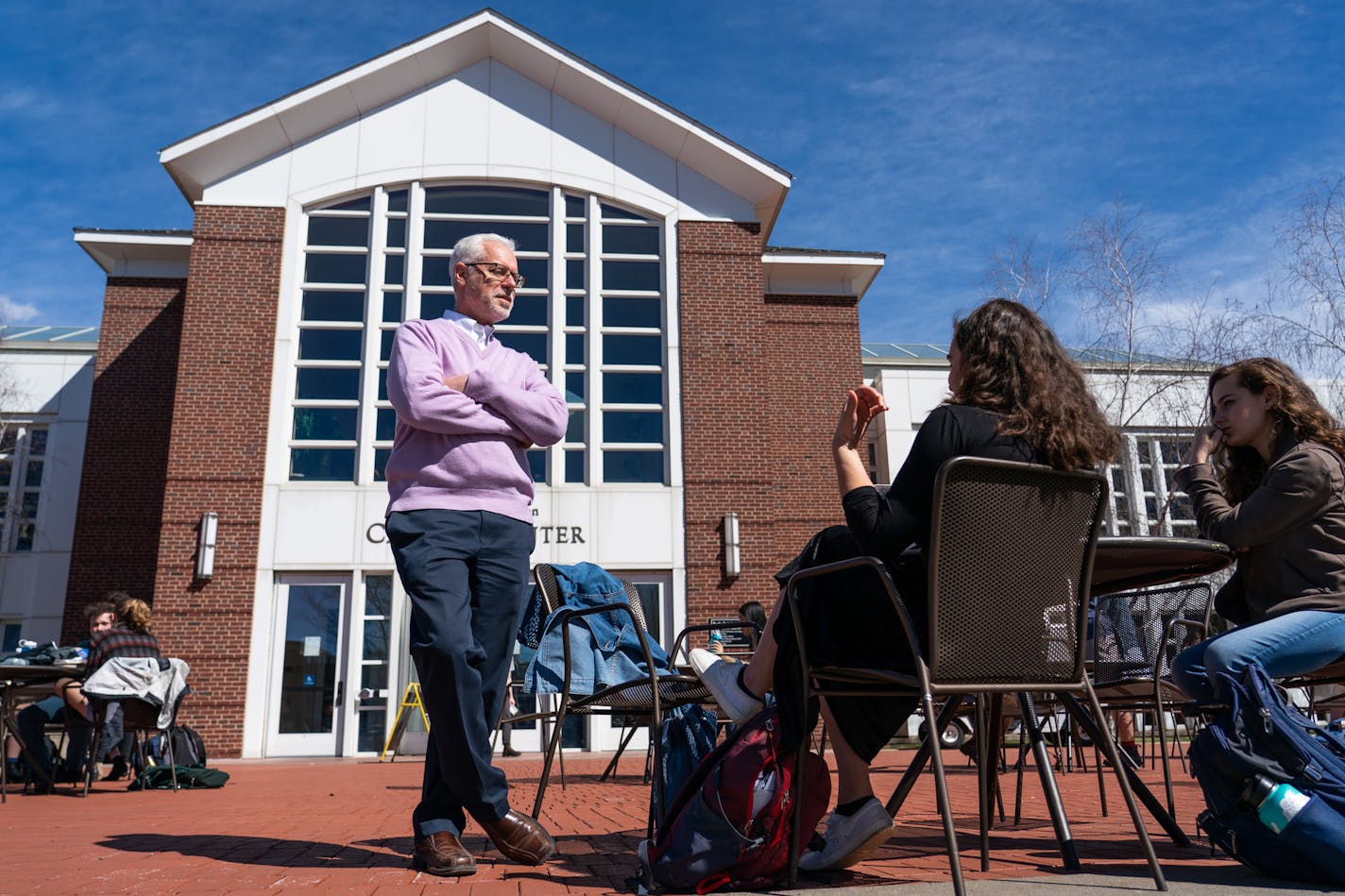 Rosenberg chatted with international studies junior Amalia Chiapperino and psychology junior Lilli Kay as they worked outside on campus. ] MARK VANCLEAVE &#xa5; Brain Rosenberg announced today that he would be retiring after a 16-year-term as president of Macalester College. Photographed Monday, Apr 8, 2019.