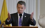 Colombia's President Juan Manuel Santos speaks to supporters of the peace deal he signed with rebels of the Revolutionary Armed Forces of Colombia, FA