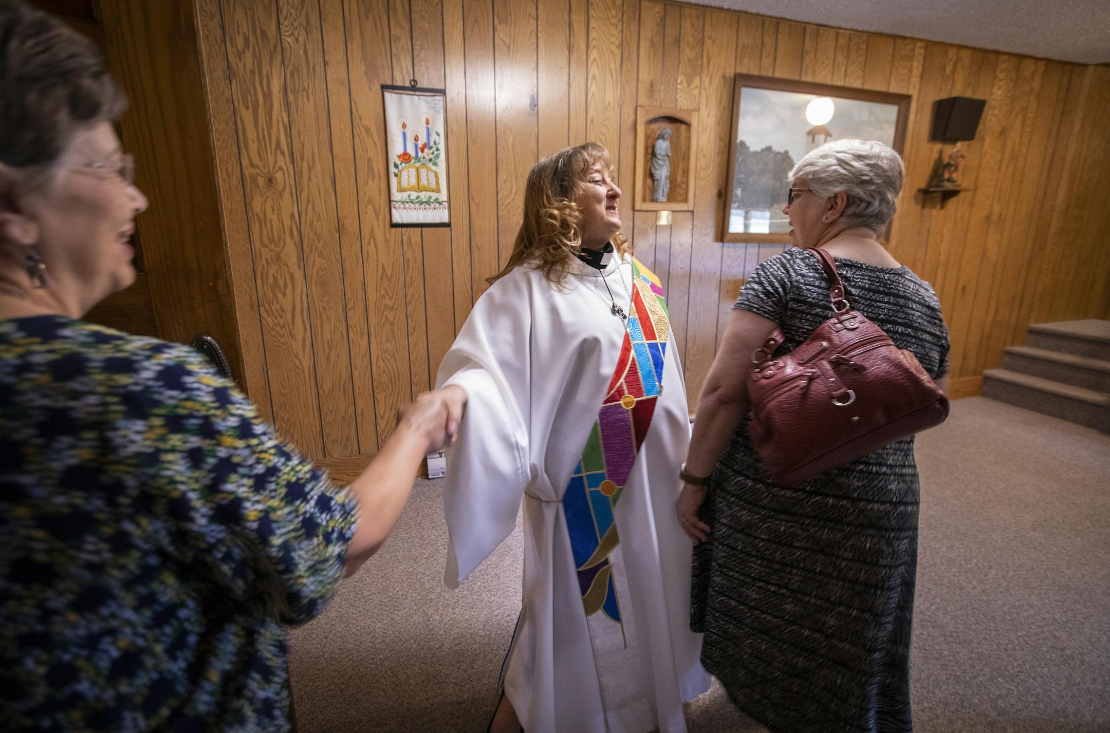 Michelle Jensen talks to congregants following Sunday service at Hoff Lutheran Church in Rustad. ] LEILA NAVIDI ï leila.navidi@startribune.com BACKGROUND INFORMATION: Michelle Jensen, a distance learning student at Luther Seminary, leads the service at Hoff Lutheran Church in Rustad on Sunday, July 15, 2018.