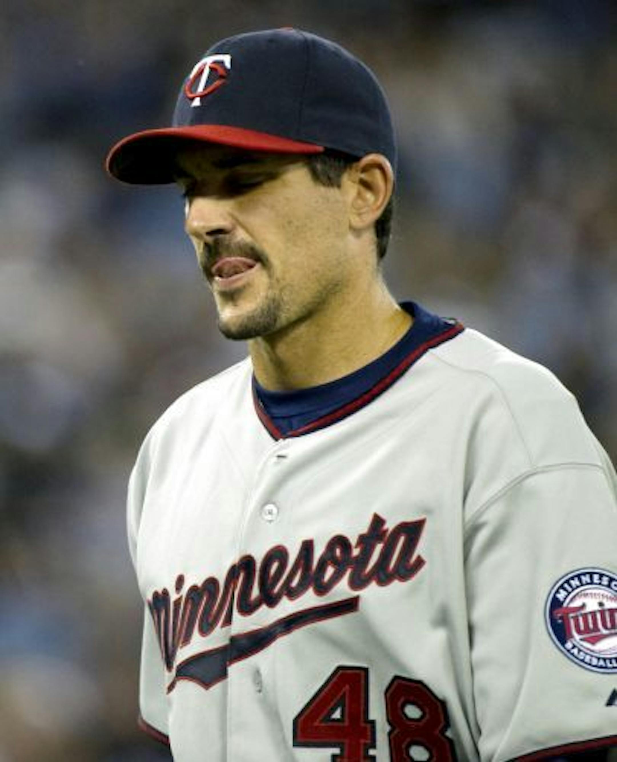 Minnesota Twins starter Carl Pavano leaves the field during fifth inning AL action against the Toronto Blue Jays in Toronto on Friday, April 1, 2011.