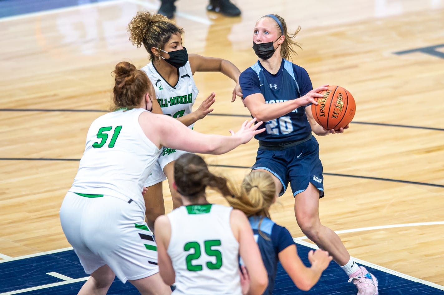 Becker's Julia Bengtson looks to the basket Tuesday night in the Class 3A semifinal at Target Center. Photo by Earl J. Ebensteiner, SportsEngine