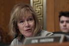 FILE - In this Sept. 24, 2019, file photo, Sen. Tina Smith, D-Minn., speaks during an executive session of the Senate Health, Education, Labor and Pen