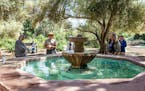 The Mission fountain, filled by water pumped up from below and an essential source of water for 18th century residents, now offers a shady spot for a 