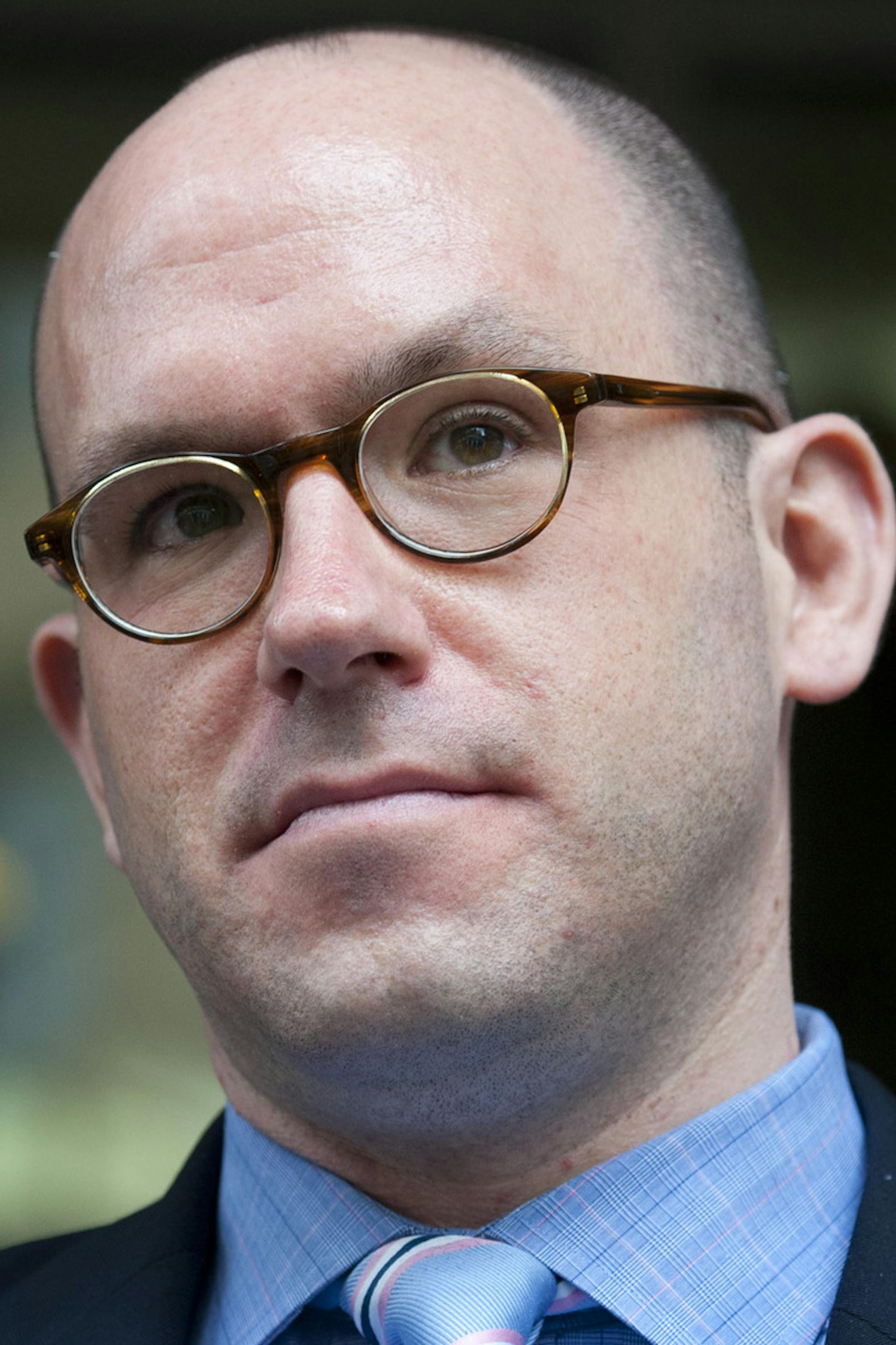 Michael Brodkorb and his attorney Gregory Walsh spke to media outside the Minneapolis office of the Equal Employment Opportunity Commission (EEOC) after filing the paperwork to begin litigation related to Brodkorb's unlawful termination from the Minnesota Senate. Wednesday, March 21, 2012. ] GLEN STUBBE * gstubbe@startribune.com ORG XMIT: MIN2012121116344489