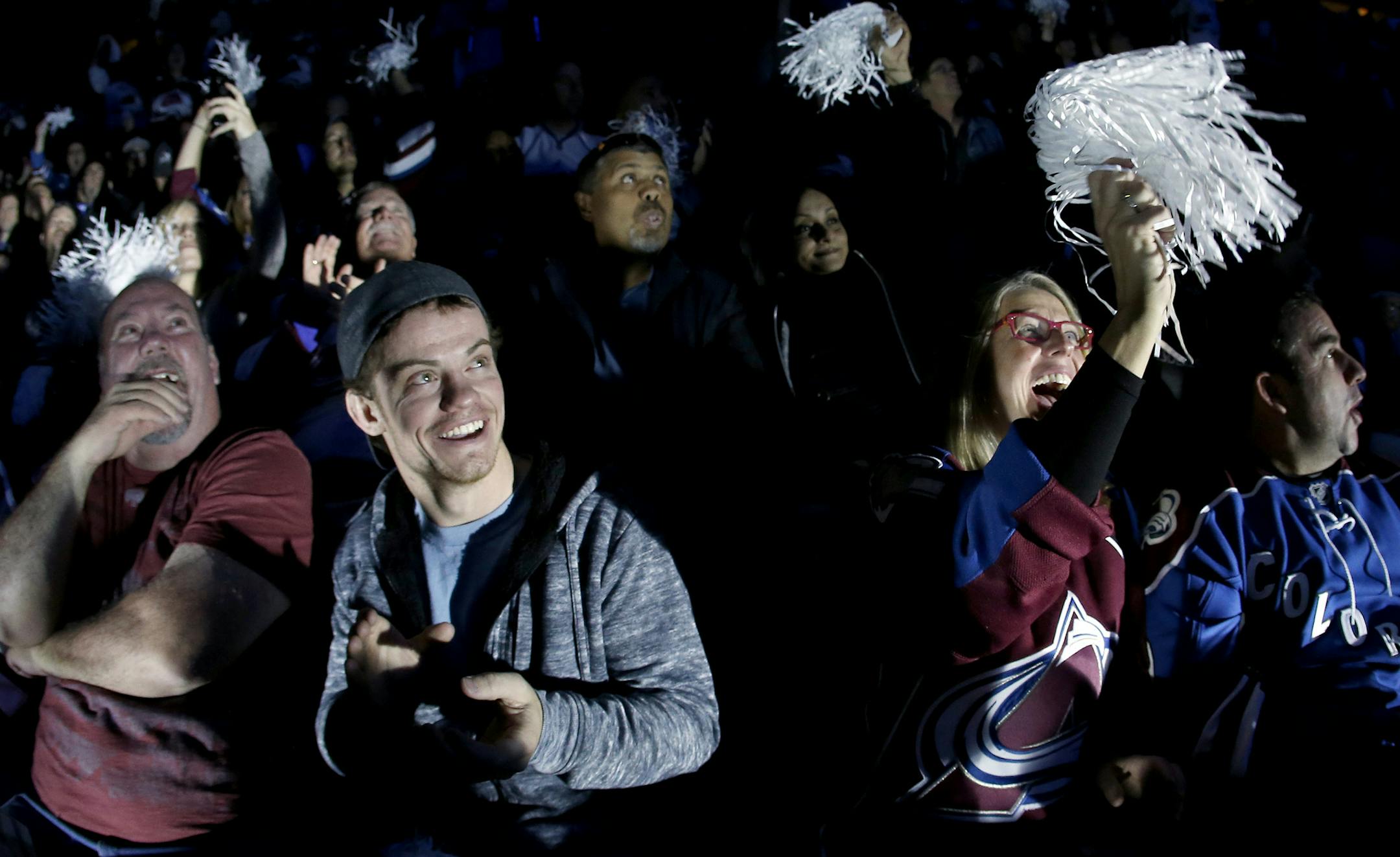 Fans cheered during the pregame festivities of game 1 between the Minnesota Wild Colorado Avalanche. ] CARLOS GONZALEZ cgonzalez@startribune.com - April 17, 2014, Denver, Colorado, Pepsi Center, NHL, Minnesota Wild vs. Colorado Avalanche, Stanley Cup Playoffs round 1, Game 1