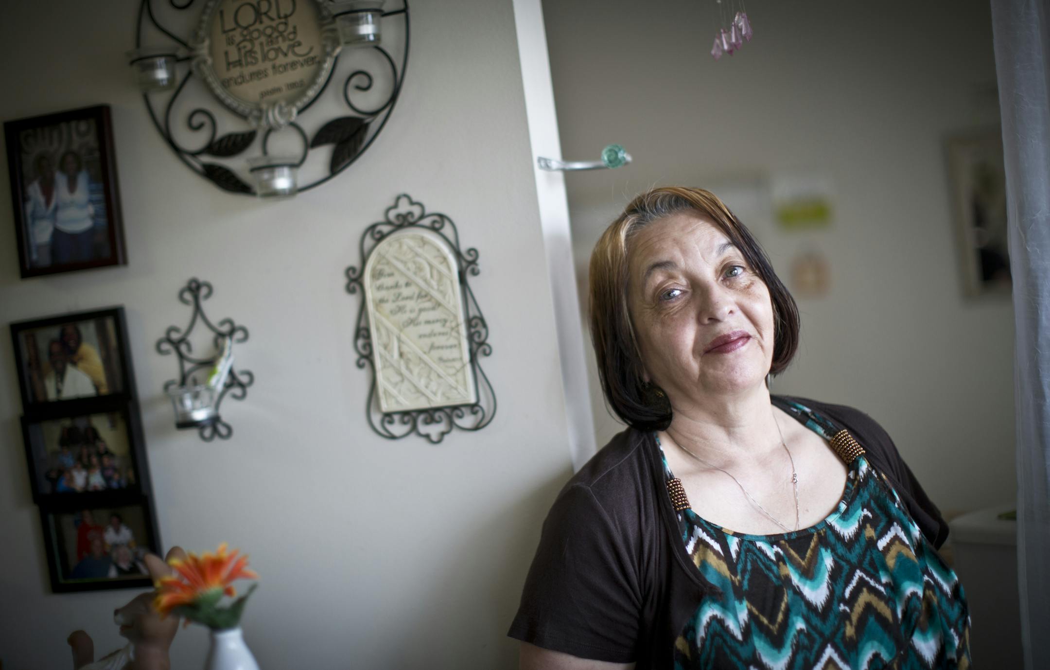 Sheila Mack, who lives in Minneapolis Public Housing, was given a section 8 voucher by a Metropolitan Council administered program so she could get into her own apartment. She had been on a waiting list for 7 years. Now the voucher has been put on hold as a result of sequestration. She stood in her one bedroom apartment in Minneapolis, Minn. on Friday, April 5, 2013. ] (RENEE JONES SCHNEIDER * reneejones@startribune.com)