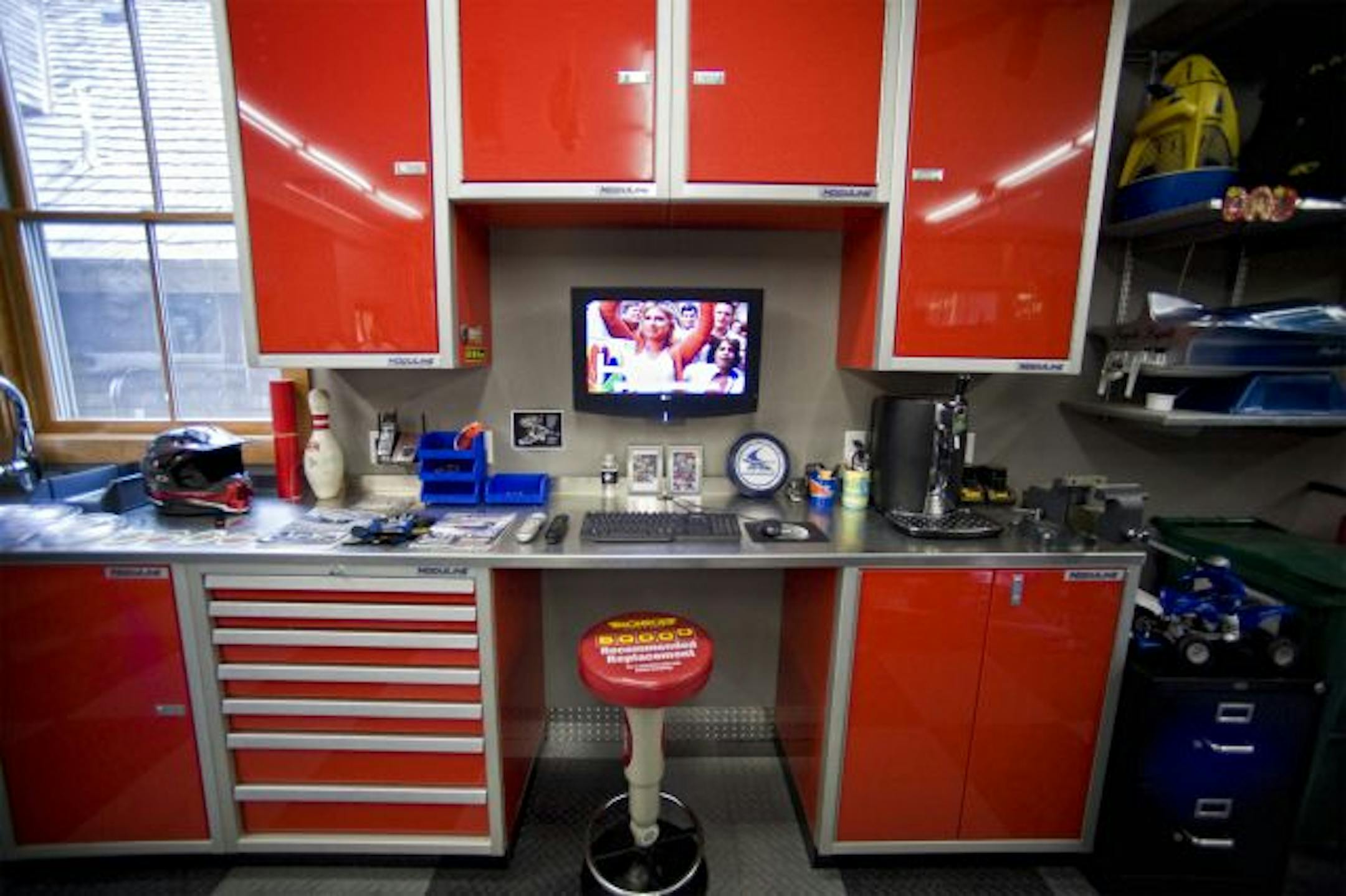 Jeff Murphy's lower level workshop. Jeff Murphy desined and built his home away from home with two levels, rec room, bar, work area for his motorized toys adjacent to his home on Buffalo Lake.