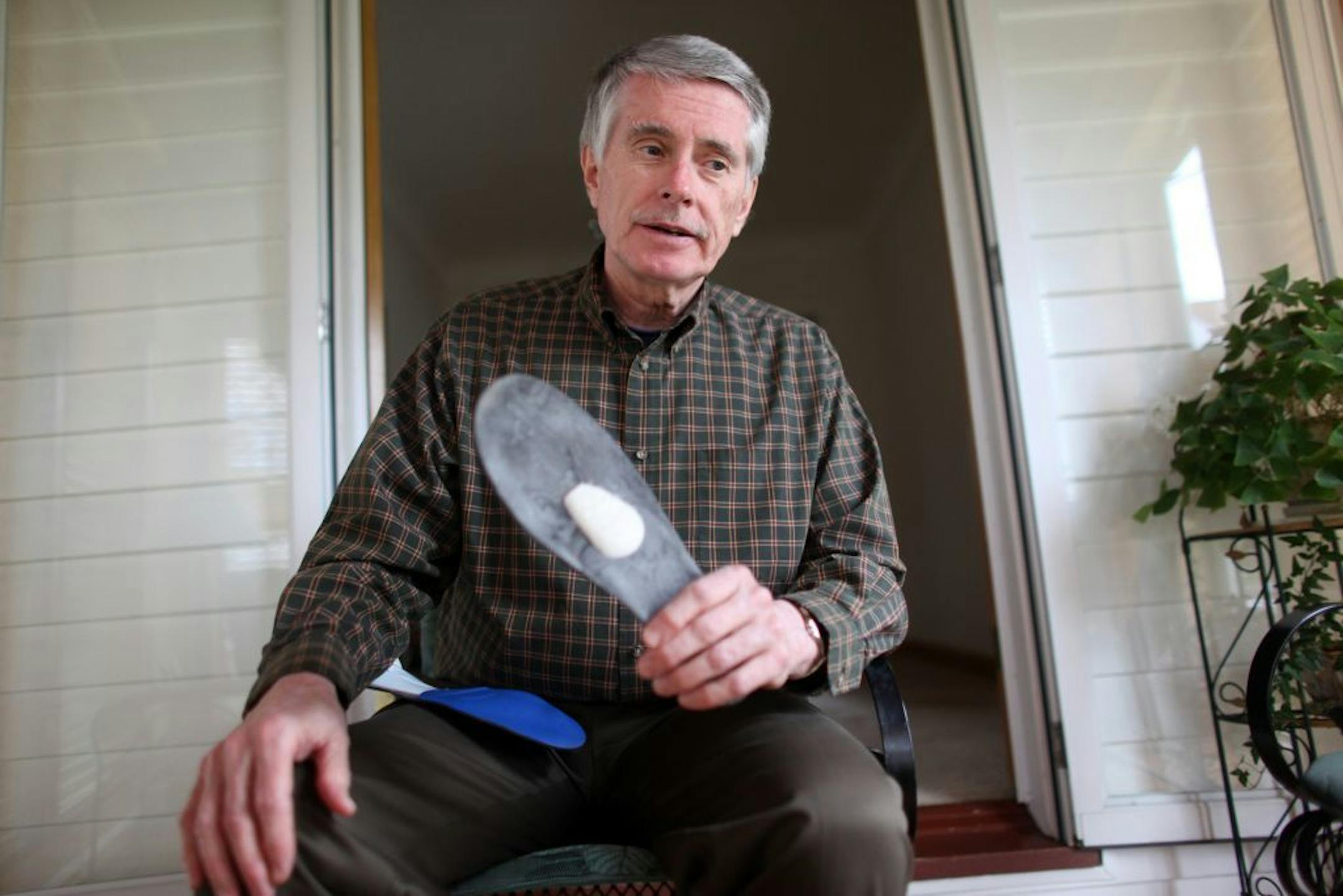 Hugh Morris paid $390 for shoe inserts even though his insurer covered the costs of the service. Morris won a $530 judgment against Dr. Mullin last year.